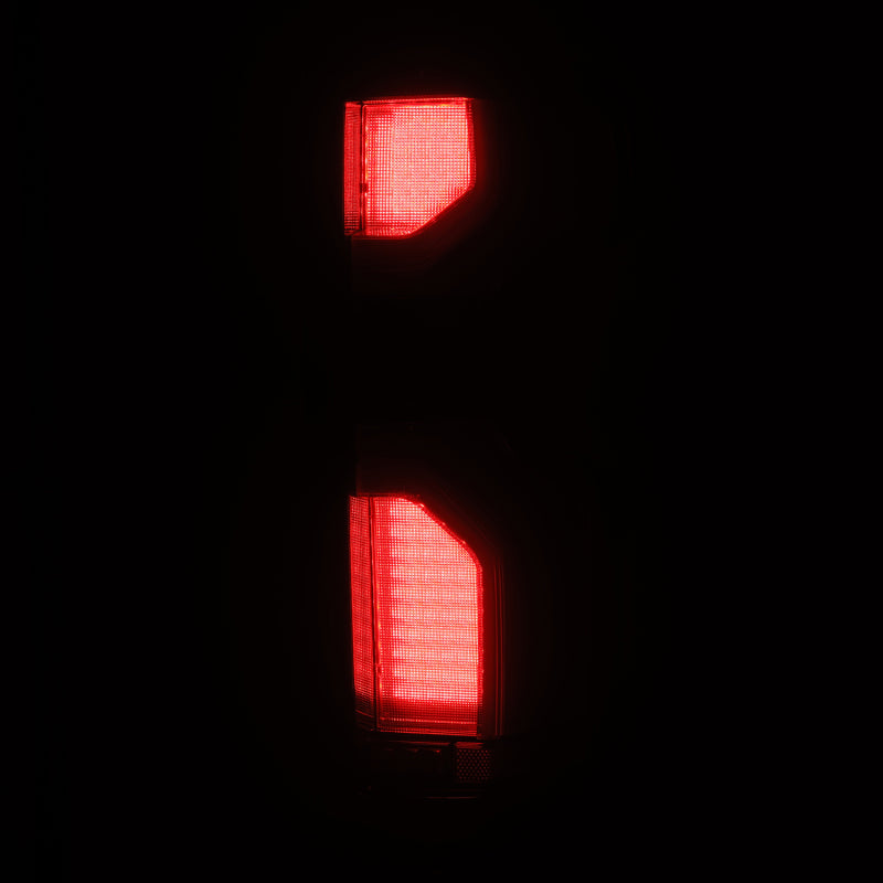 AlphaRex LUXX-Series LED tail lights for 19-24 Chevy Silverado 1500 and 20-24 2500HD/3500HD in black finish.