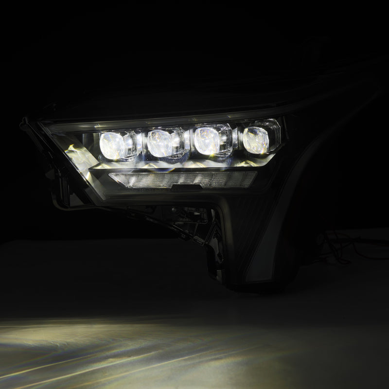AlphaRex NOVA-Series black headlights for 2022-2023 Toyota Tundra with amber daytime running lights.