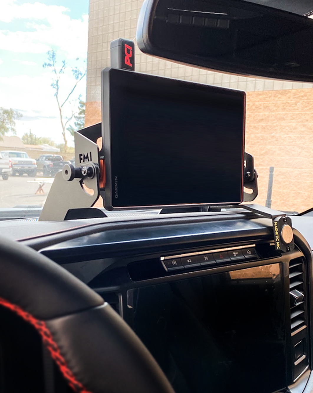 Center dash fold-down GPS mount for 2024+ Gen 3.5 Raptor, designed for Garmin TREAD XL, showcasing easy accessibility and installation.