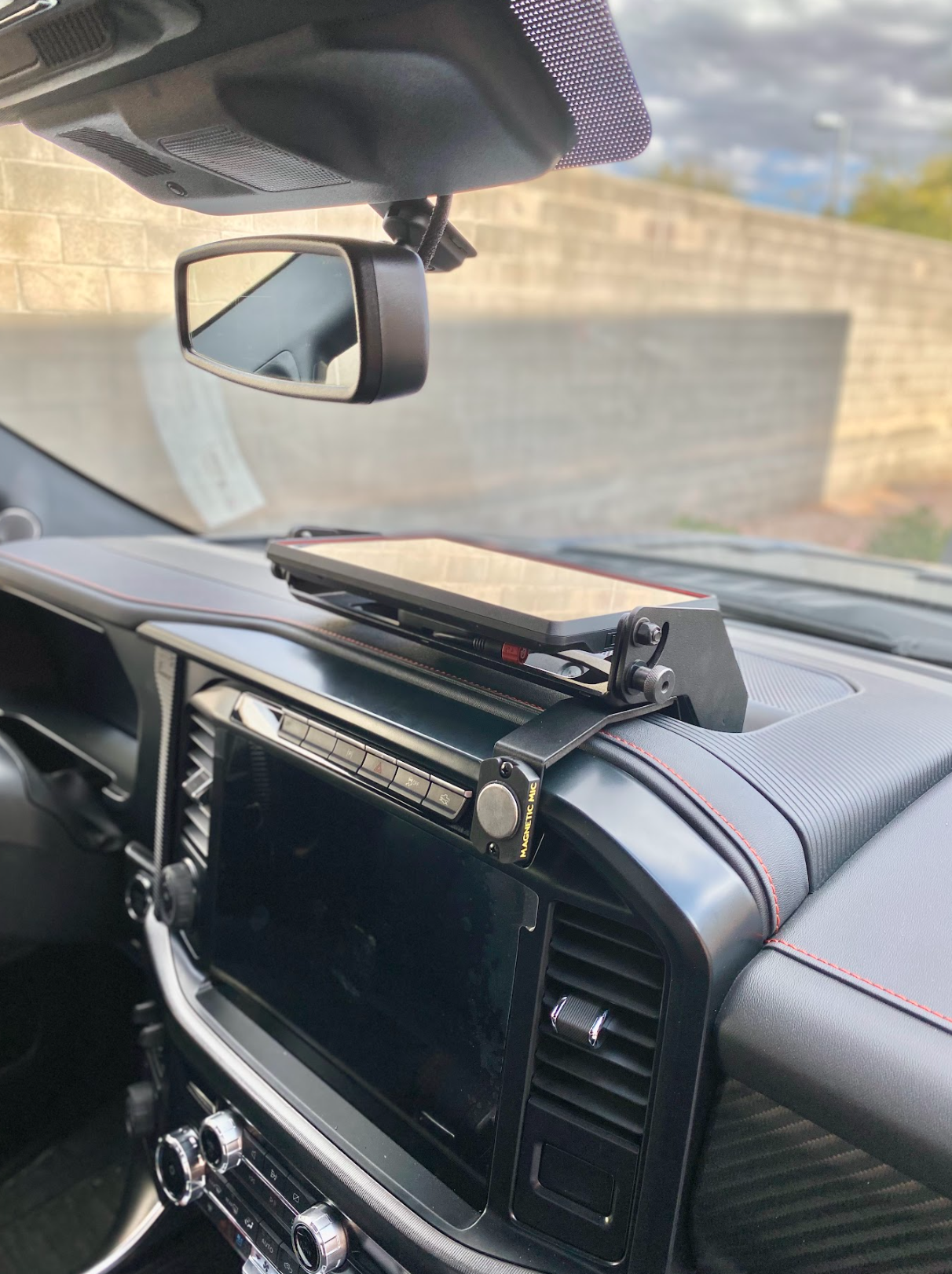 Center dash fold-down GPS mount for 2024+ Gen 3.5 Raptor, designed for Garmin TREAD XL, showcasing sleek installation.