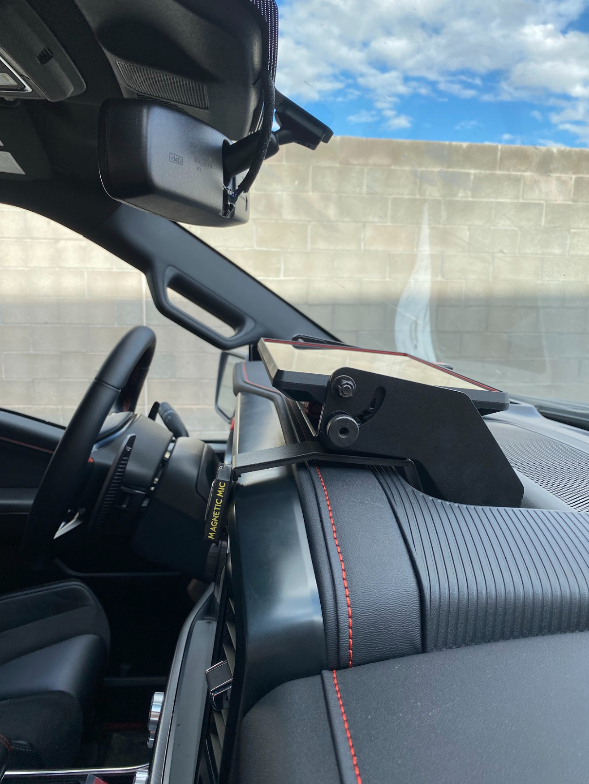 Center dash fold-down GPS mount for 2024+ Gen 3.5 Raptor, designed for Garmin TREAD XL, showcasing sleek installation.