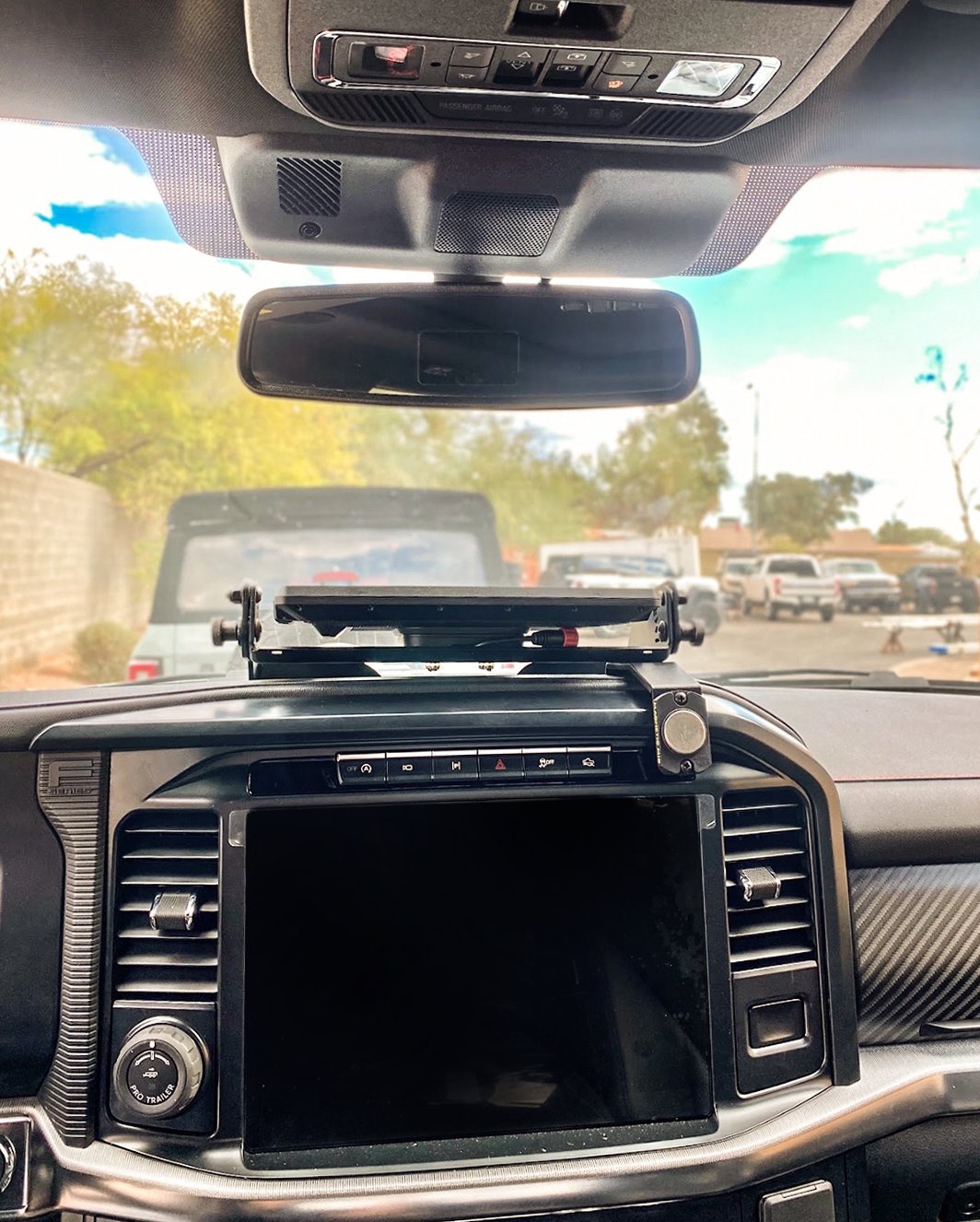 Center dash GPS mount for 2024+ Gen 3.5 Raptor, designed for Garmin TREAD XL, showcasing a sleek installation in a vehicle.