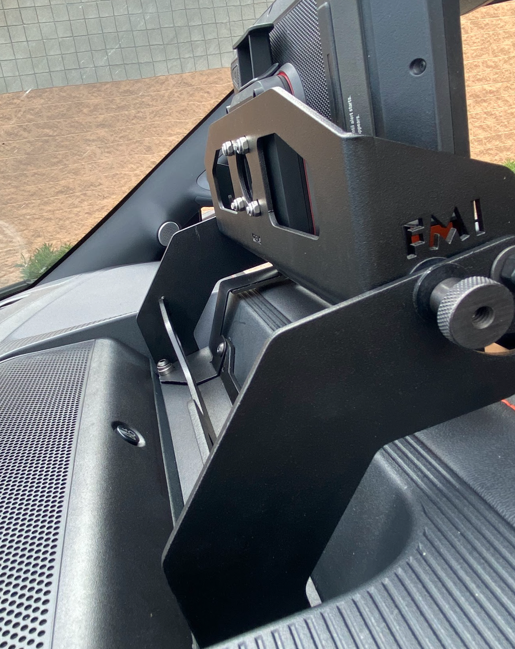 Center dash fold-down GPS mount for 2024+ Gen 3.5 Raptor, designed for Garmin TREAD XL, showcasing sturdy metal construction.