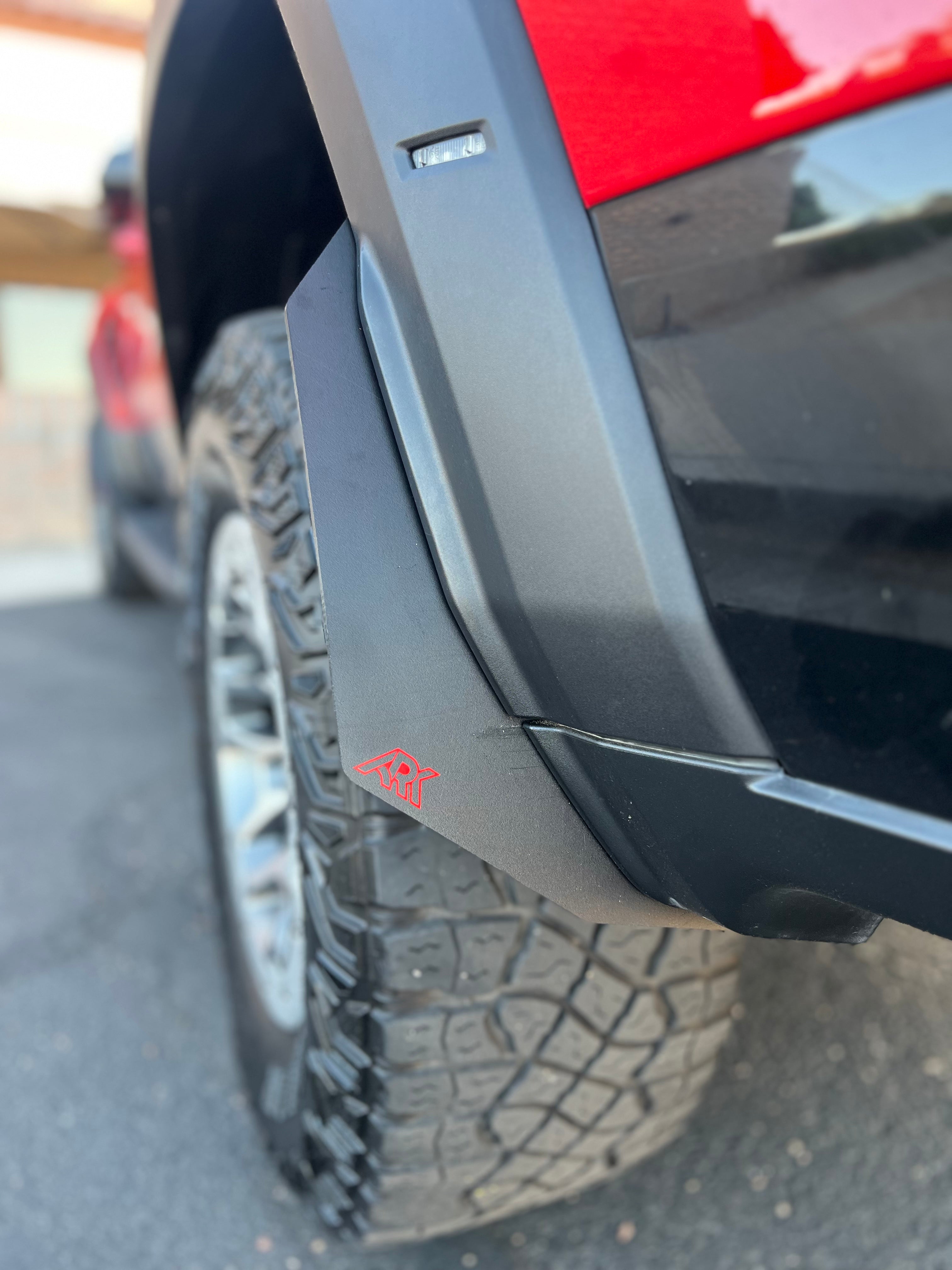 2025+ Dodge RAM RHO Micro Flares installed on a truck, enhancing the vehicle's rugged look and tire coverage.