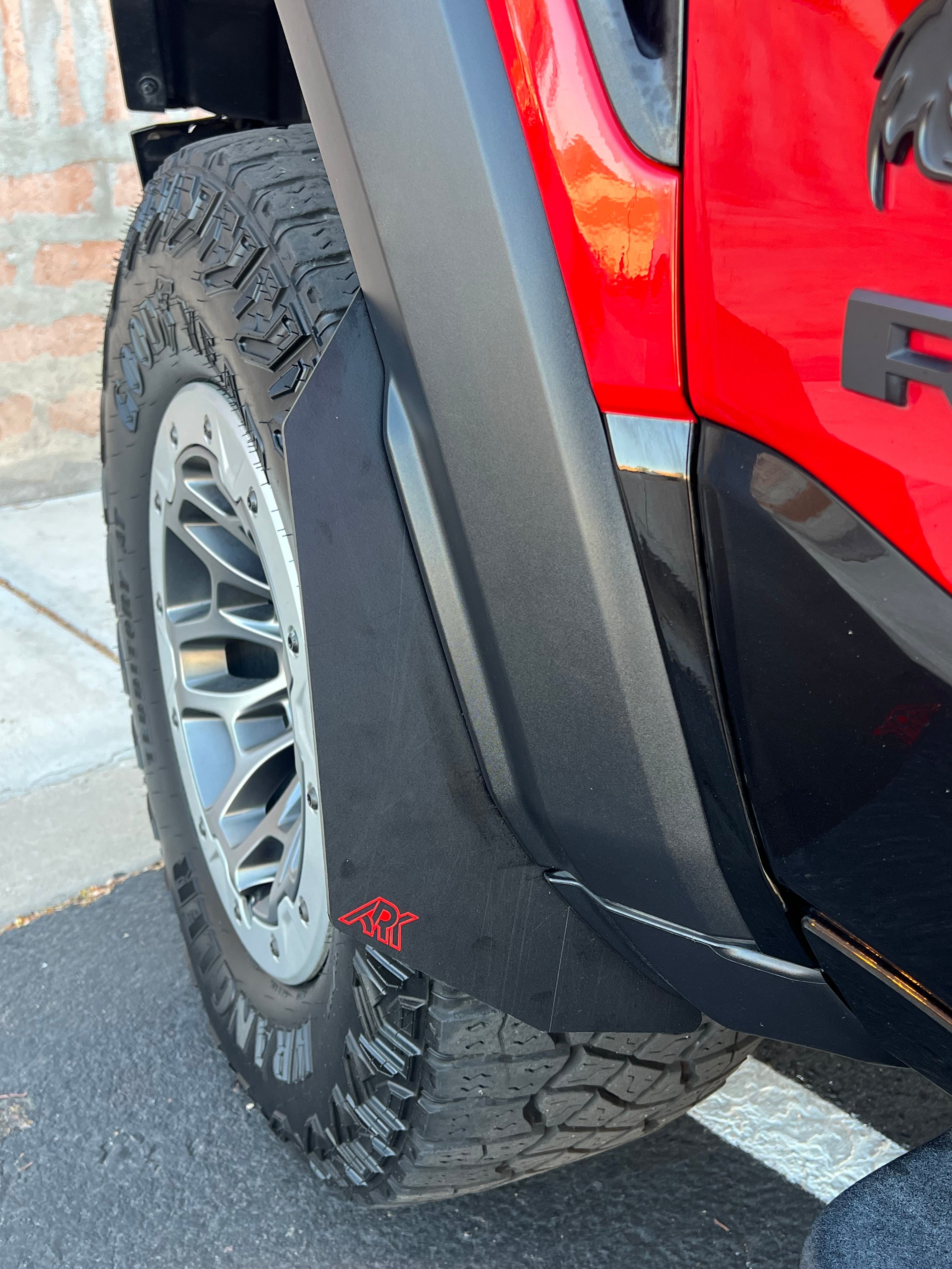 2025+ Dodge RAM RHO Micro Flares installed on a truck, enhancing its rugged appearance and providing tire protection.