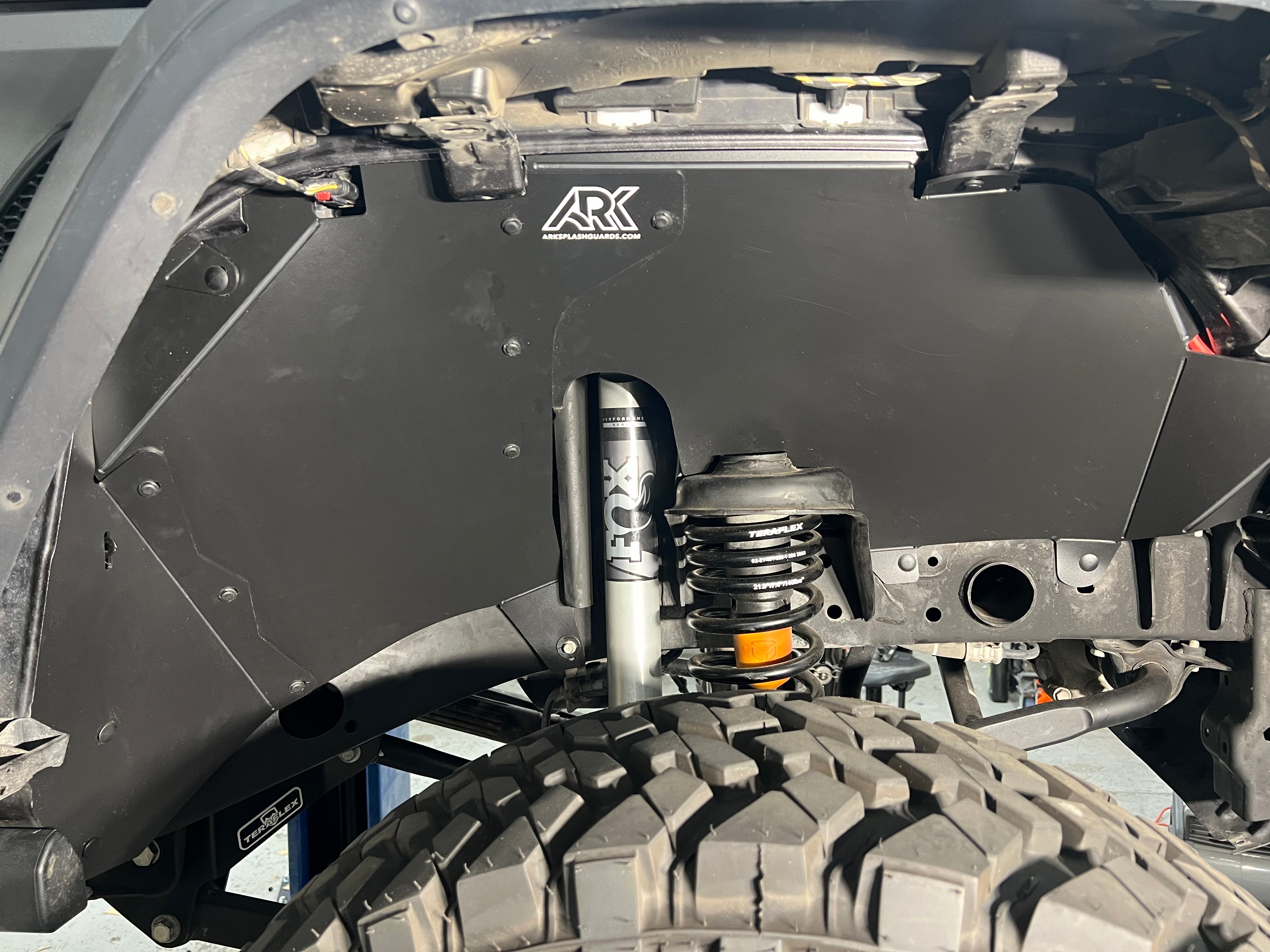 2020-23 Jeep Gladiator JT fender liners showcasing durable protection and suspension components for offroad performance.