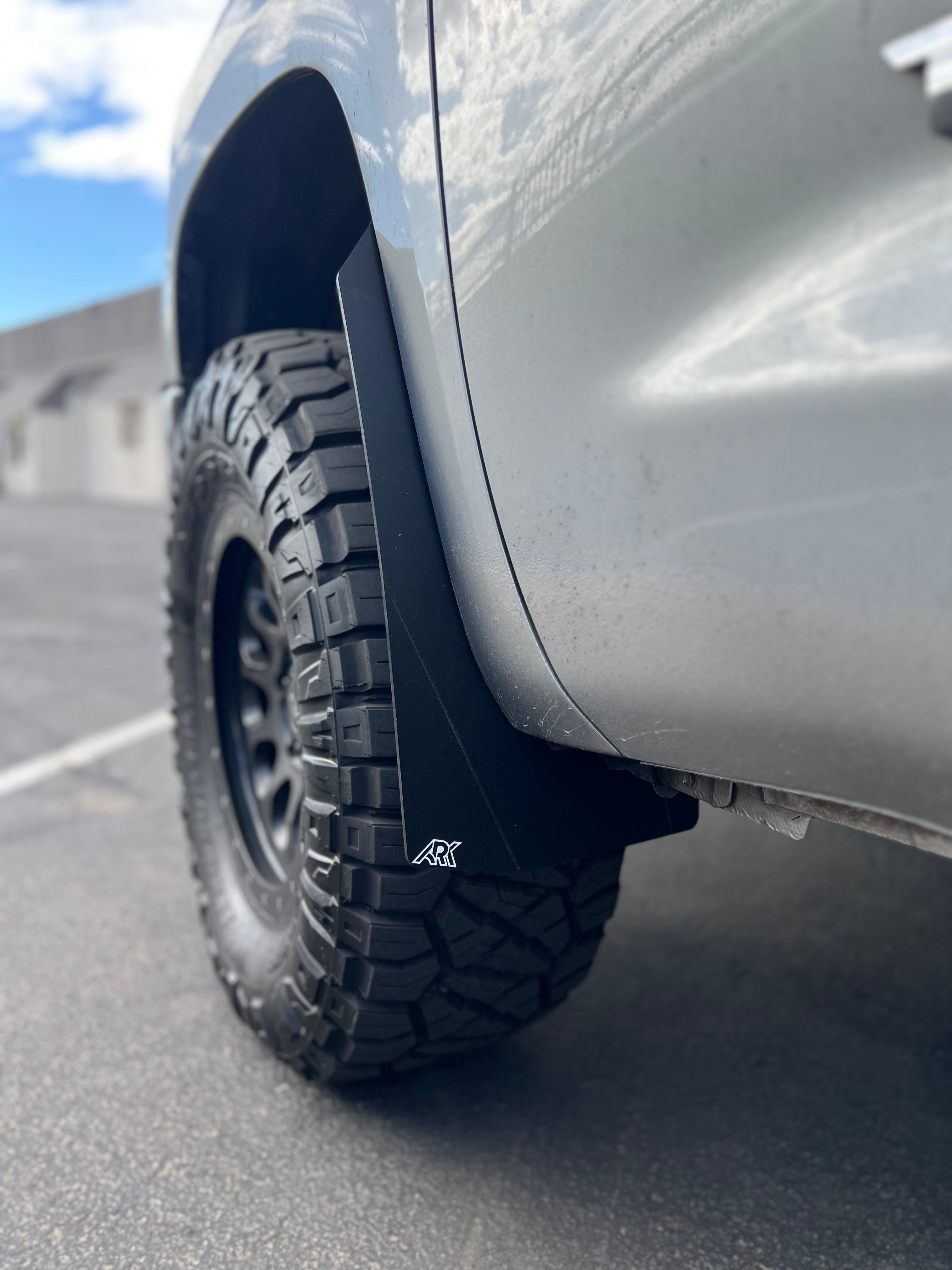 2007-2021 Toyota Tundra TriXpoly Mid Mudflaps installed on a truck, providing protection against mud and debris.