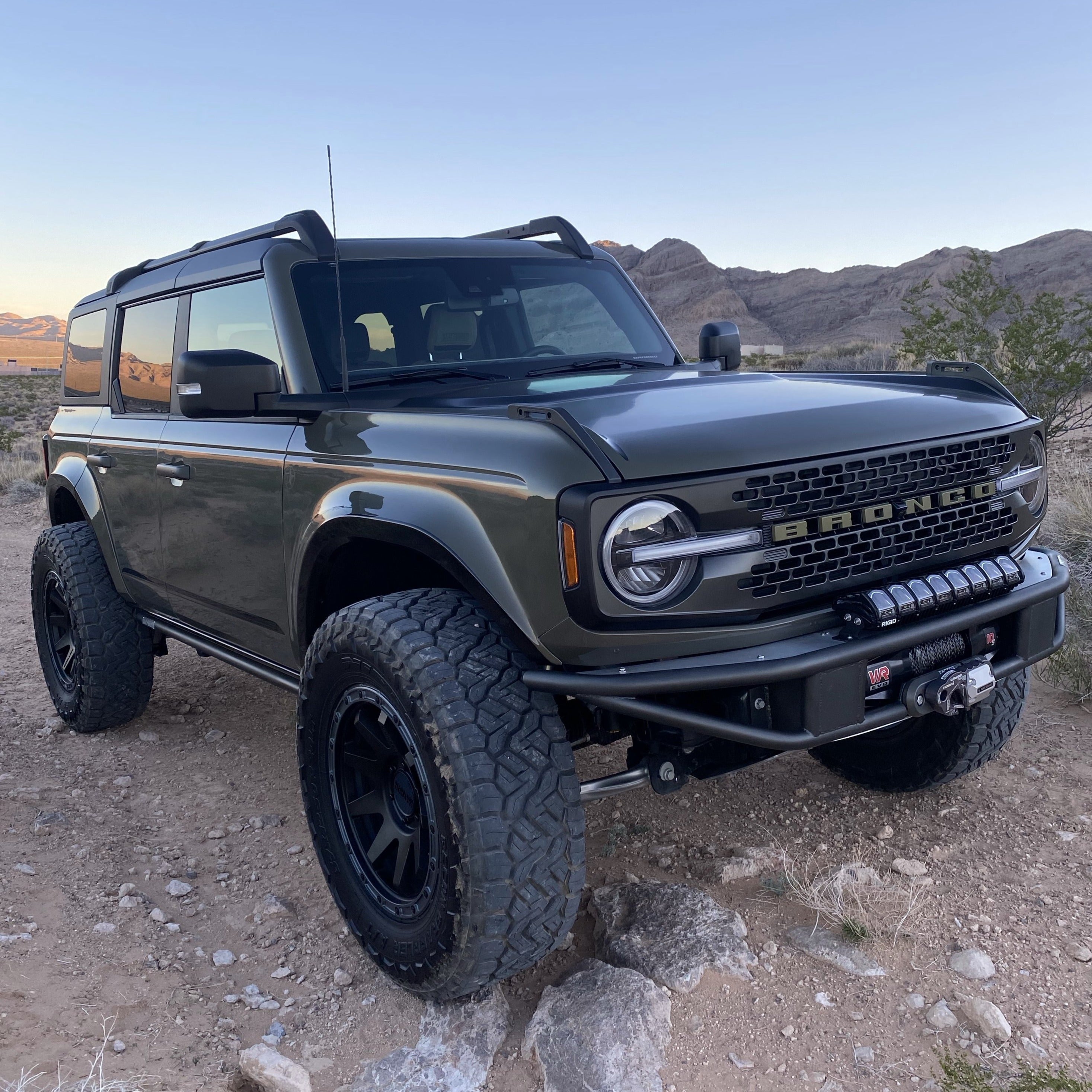 2021-2025 Ford Bronco 4-Door Rear Quarter Kit installed on an off-road vehicle in a desert landscape.