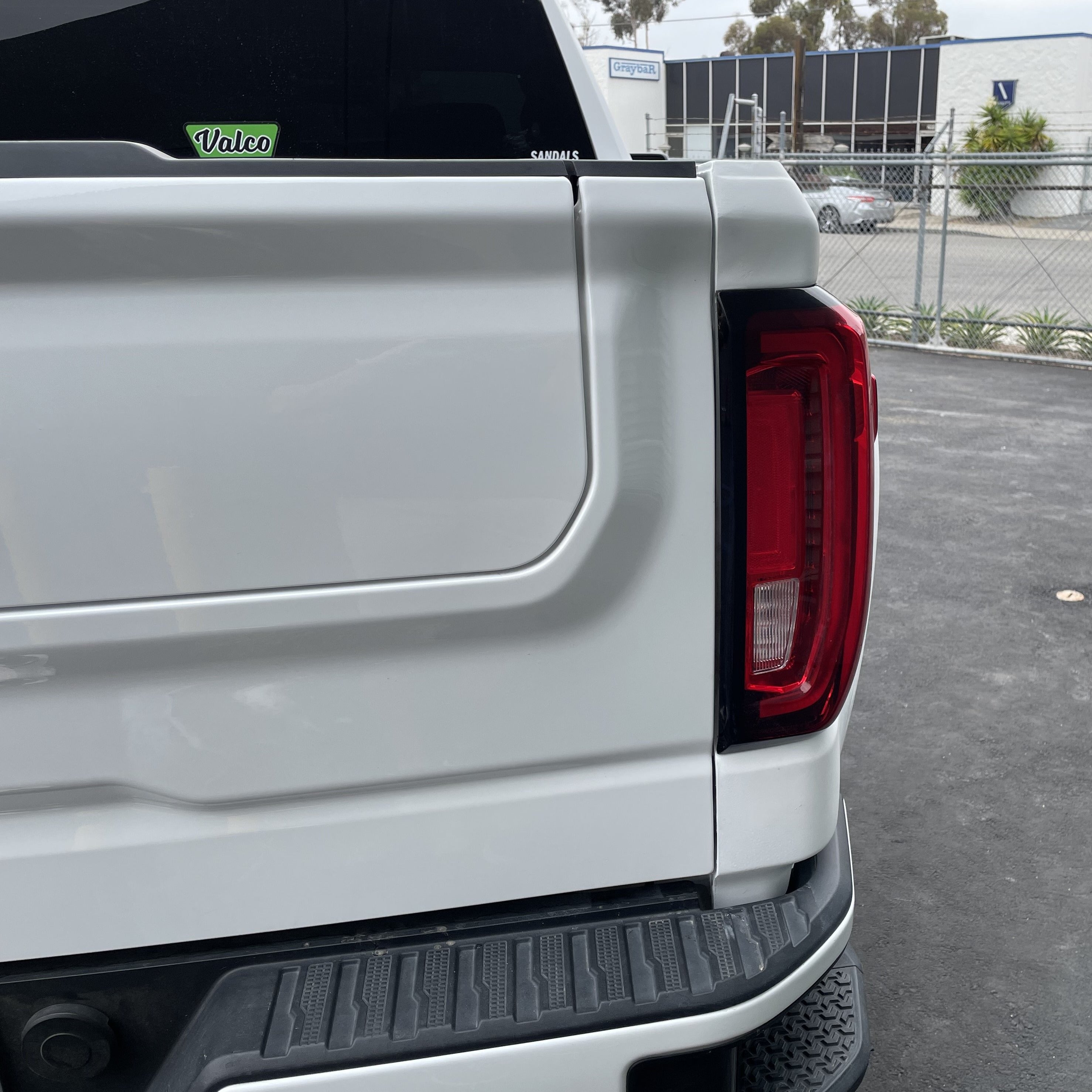 2019-2025 GMC Sierra bedside showing sleek design and integrated taillight, ideal for truck customization and repair.