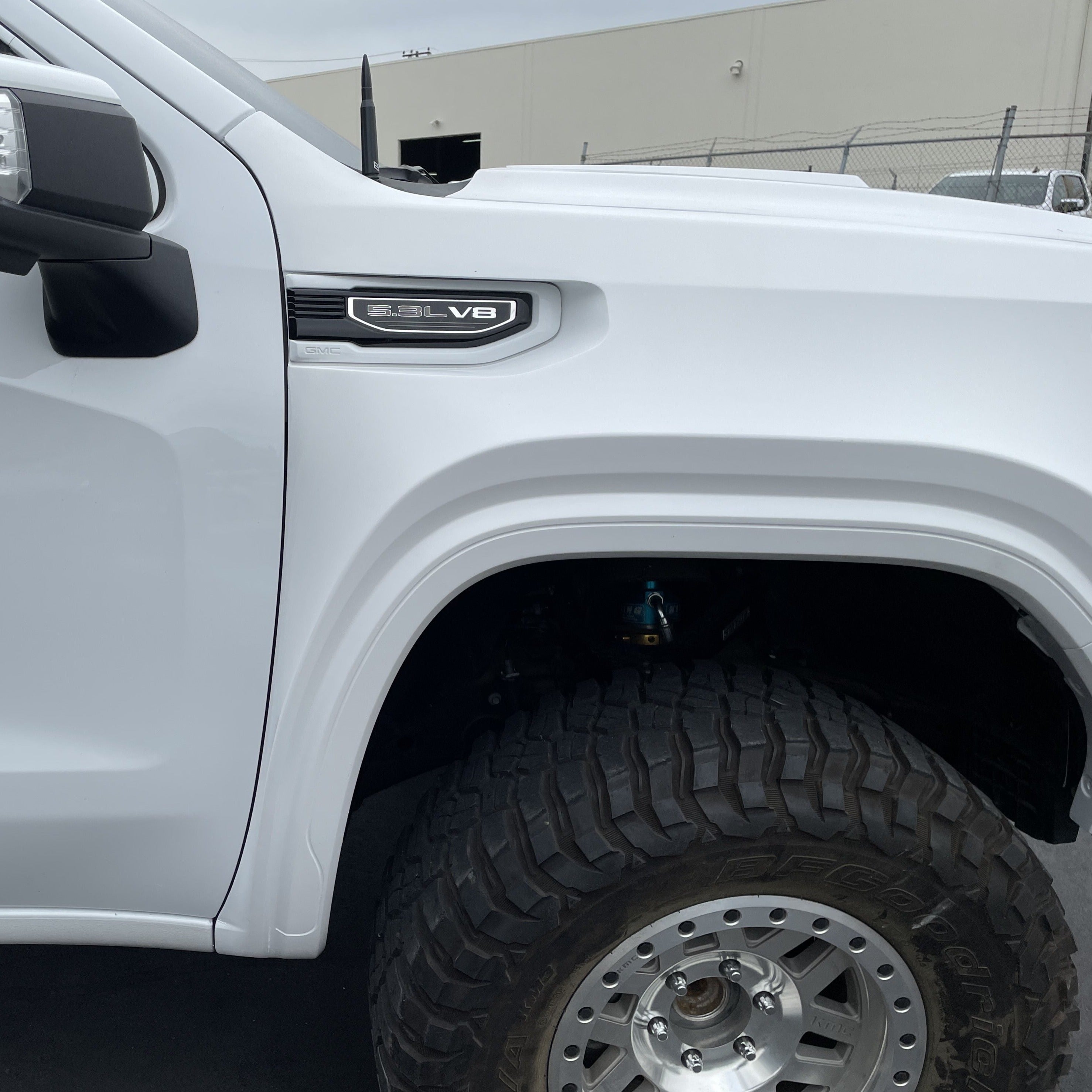 2019-2025 GMC Sierra fender showcasing a sleek design and rugged tire fitment for offroad performance.