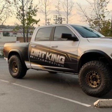 2009-2018 Dodge Ram TRX Kit showcased on a modified truck with rugged tires and custom graphics.