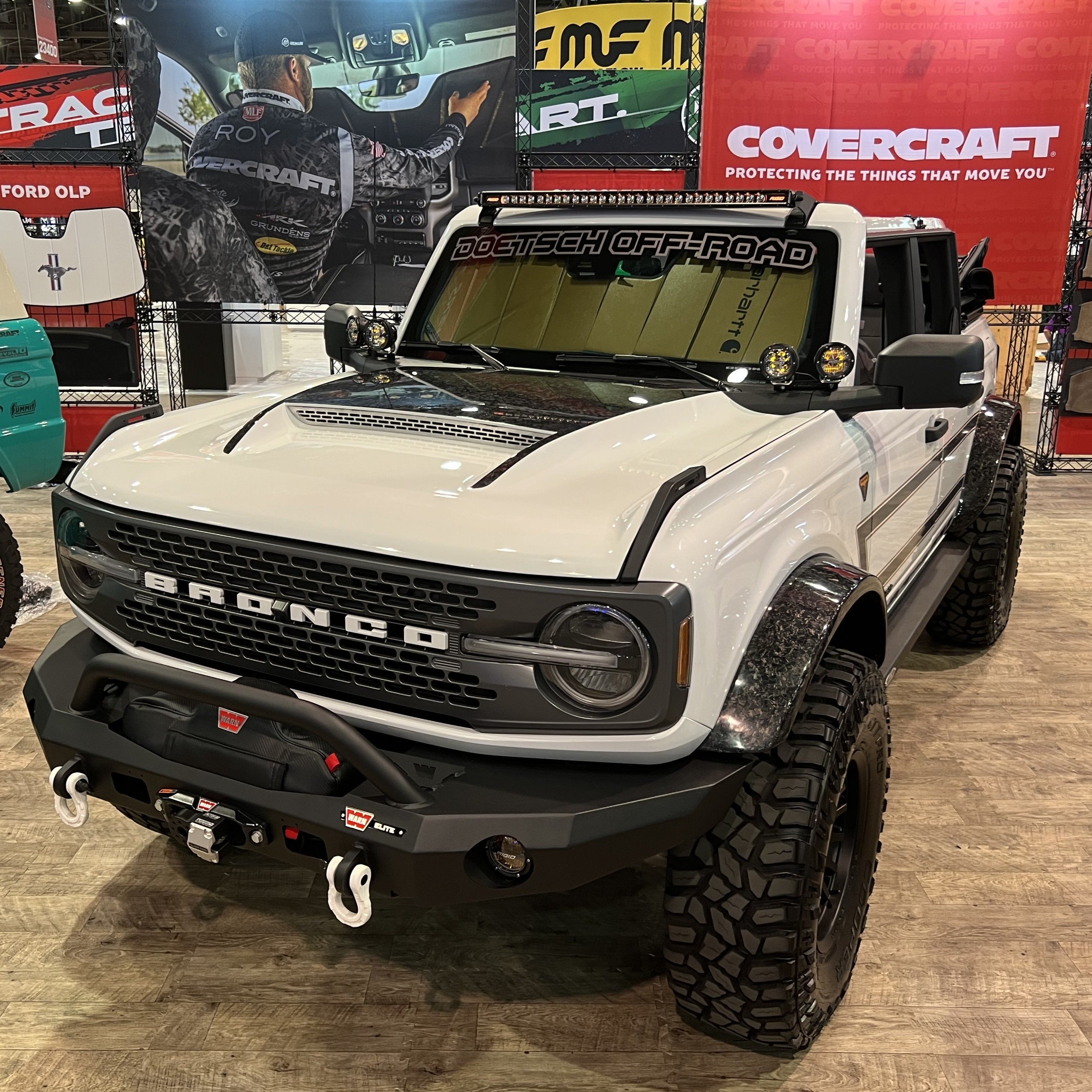 2021-2025 Ford Bronco with a Ram Air Hood, featuring off-road accessories and a rugged design for enhanced performance.