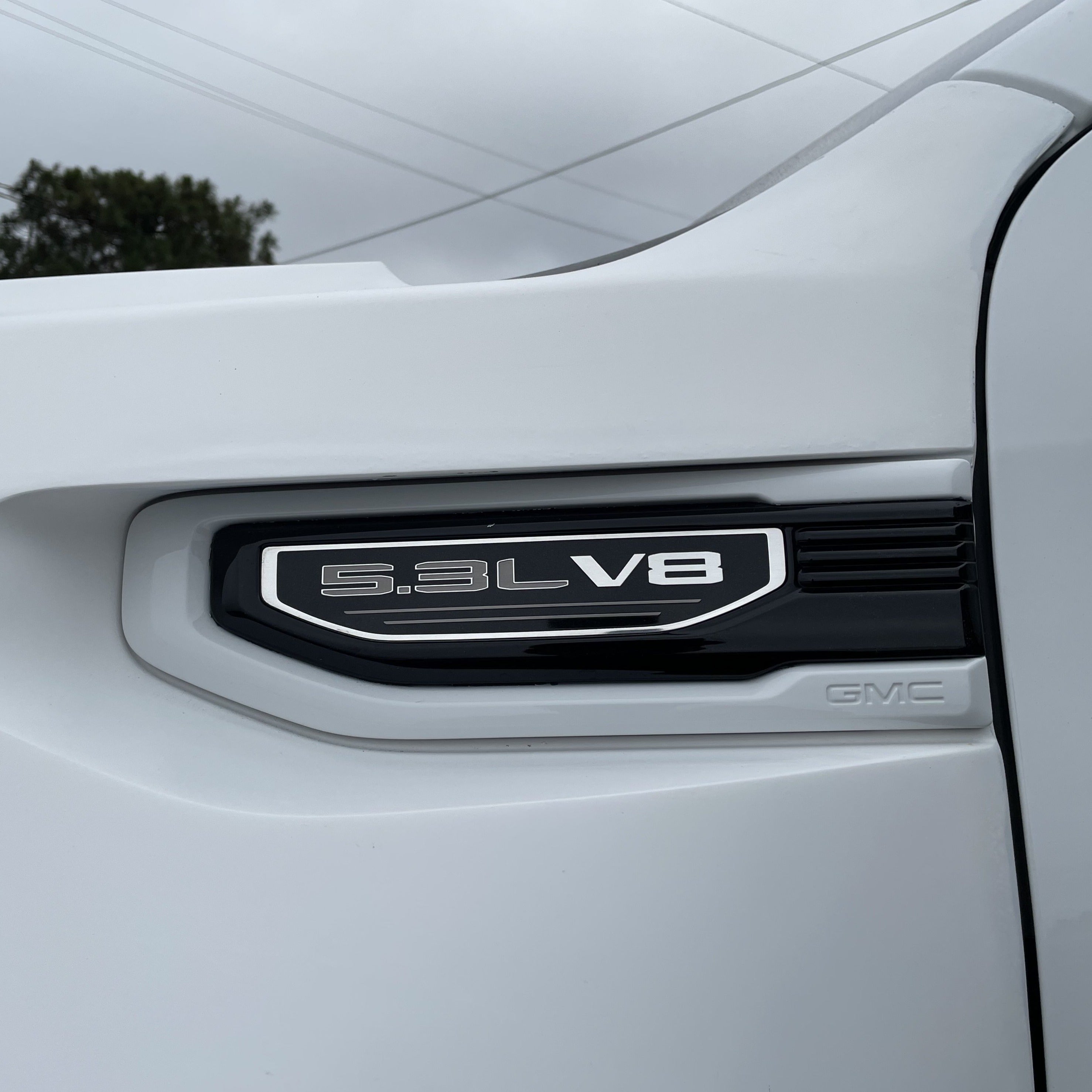 GMC Sierra fender showcasing the 5.3L V8 badge, designed for 2019-2025 models, emphasizing performance and style.