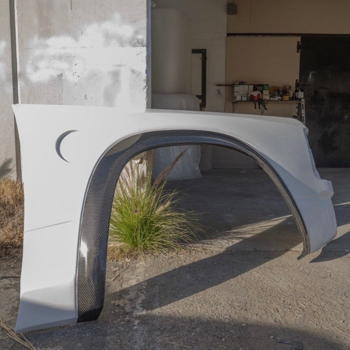 2009-2018 Dodge Ram TRX Kit fender, showcasing a sleek design with a carbon fiber finish, ideal for off-road enhancements.