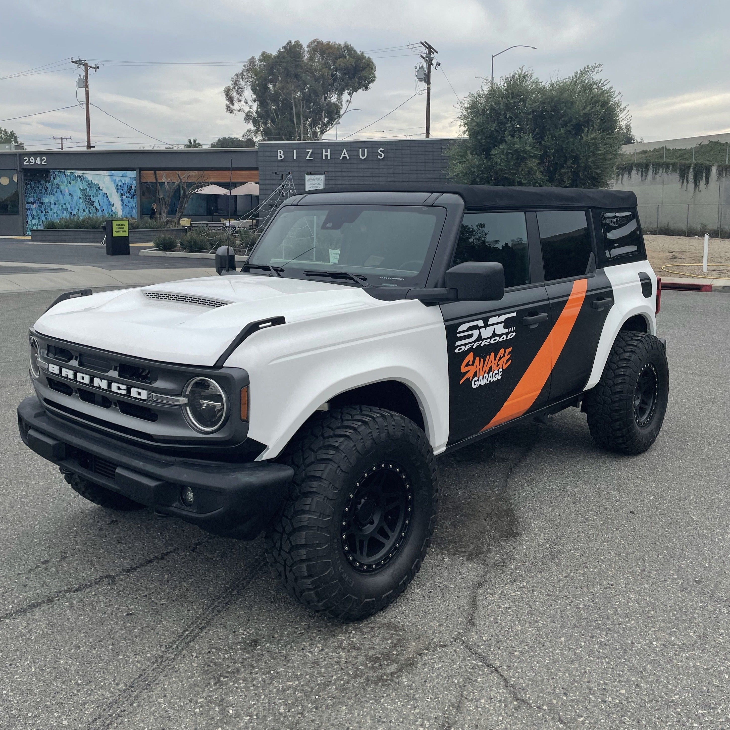 2021-2025 Ford Bronco fenders displayed on a modified white Bronco with off-road tires and a bold design.