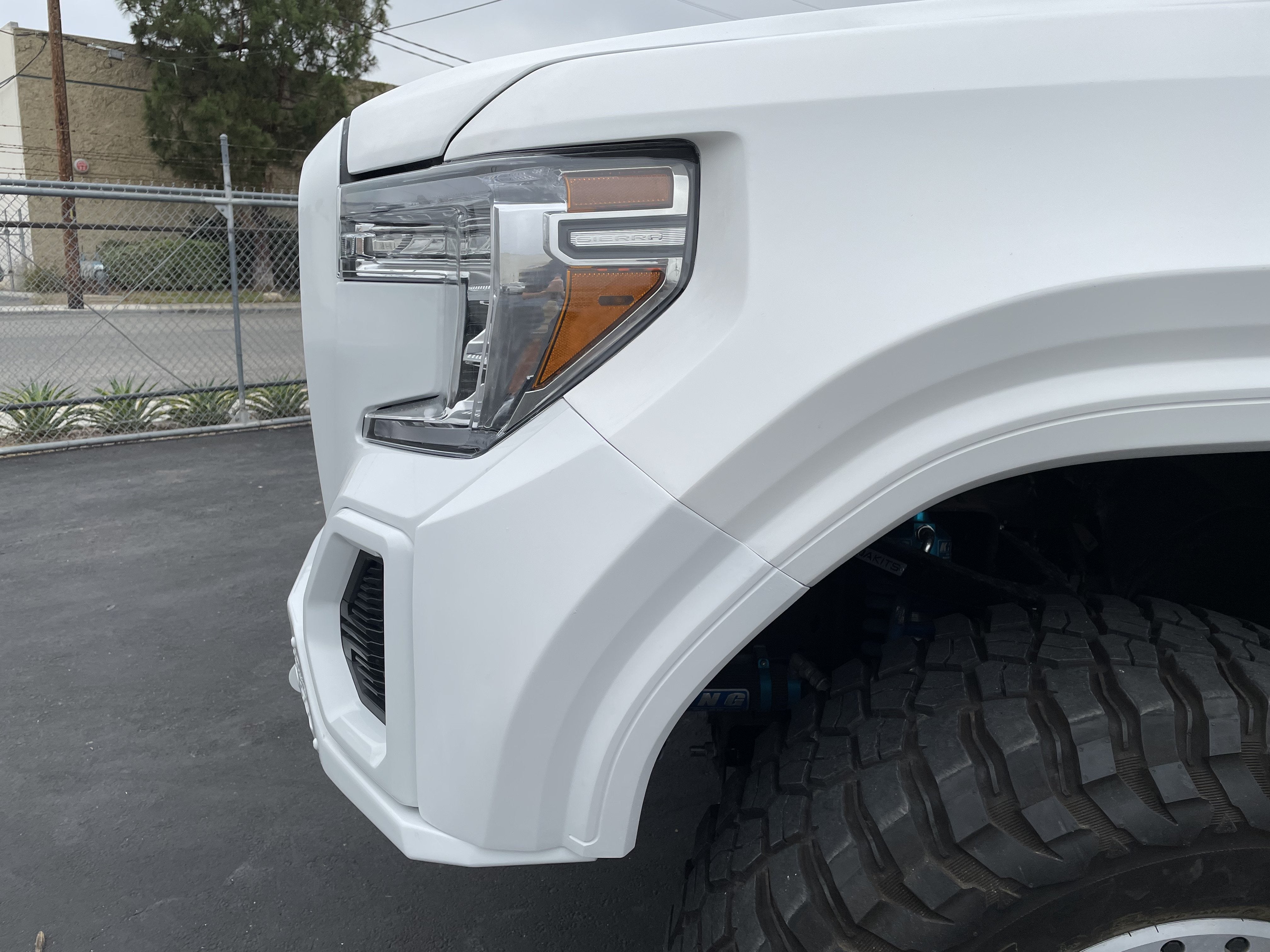 2019-2025 GMC Sierra fender showcasing a sleek design and robust construction, enhancing offroad performance.