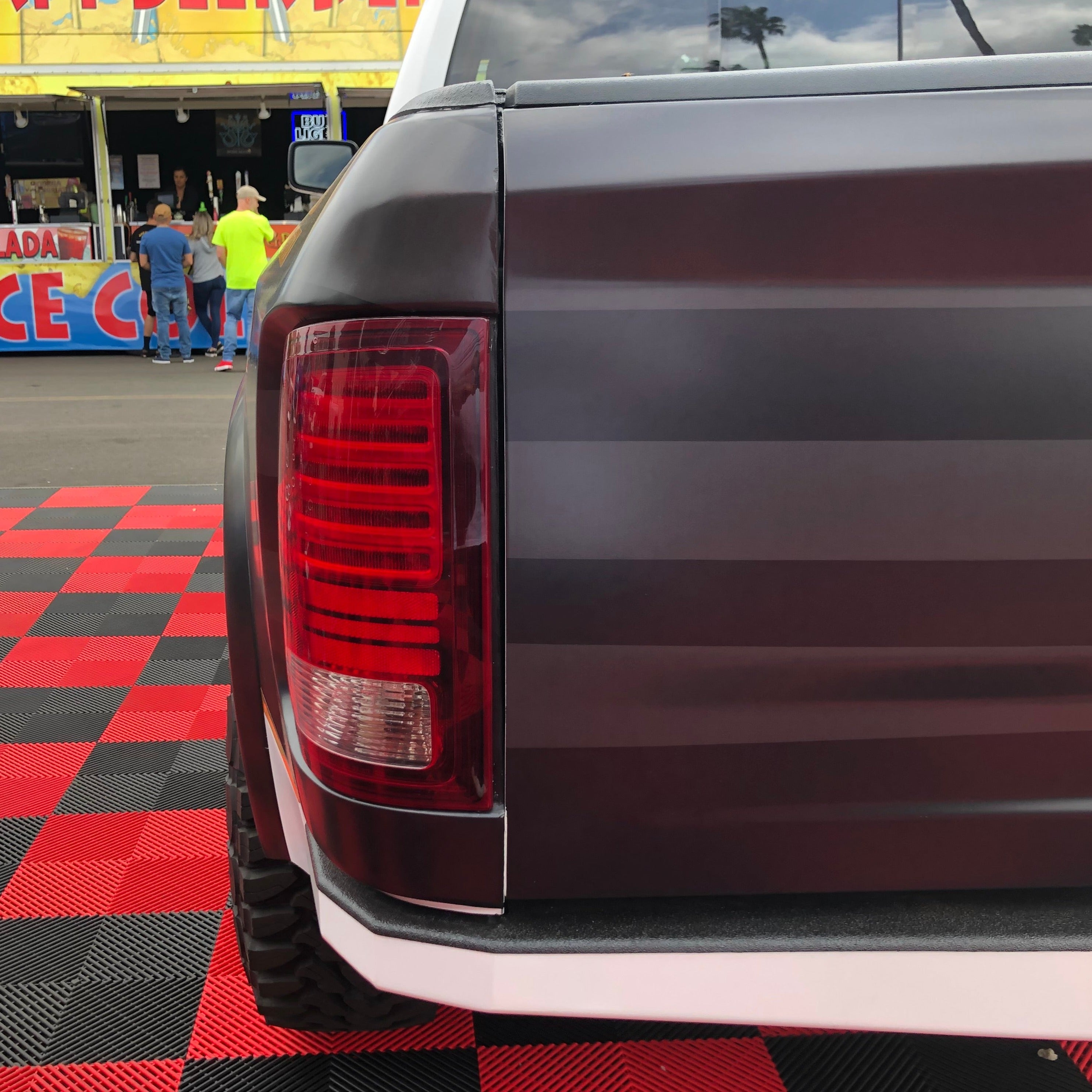 2009-2018 Dodge Ram TRX Kit showcasing the rear taillight design and rugged exterior features.