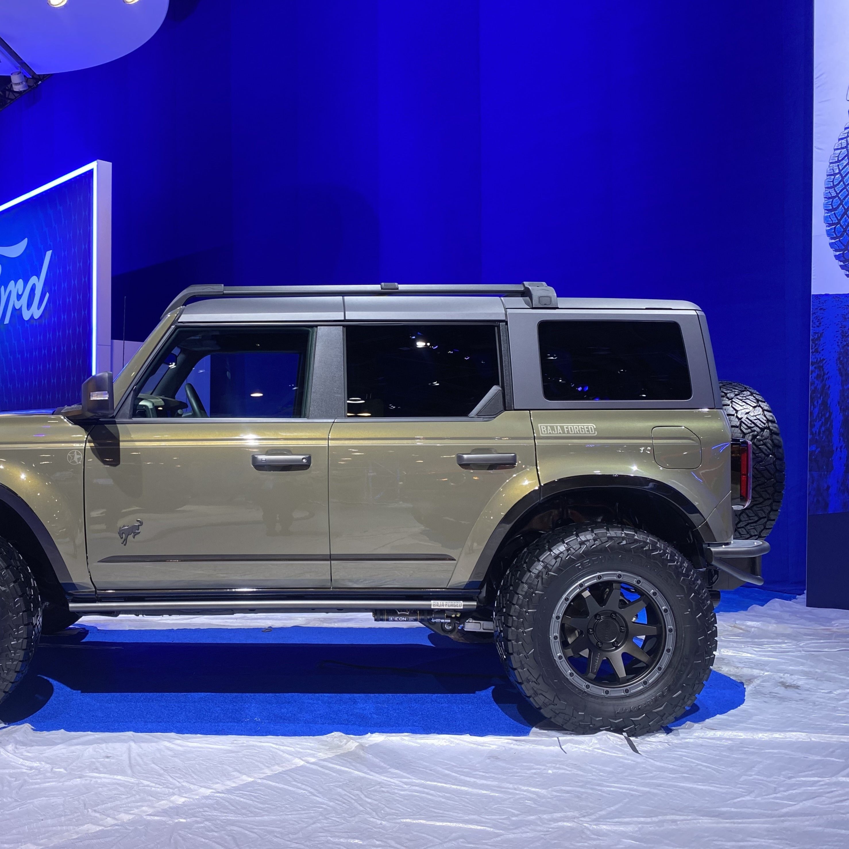 2021-2025 Ford Bronco 4-Door Rear Quarter Kit displayed on a modified Bronco with off-road tires and rugged design.