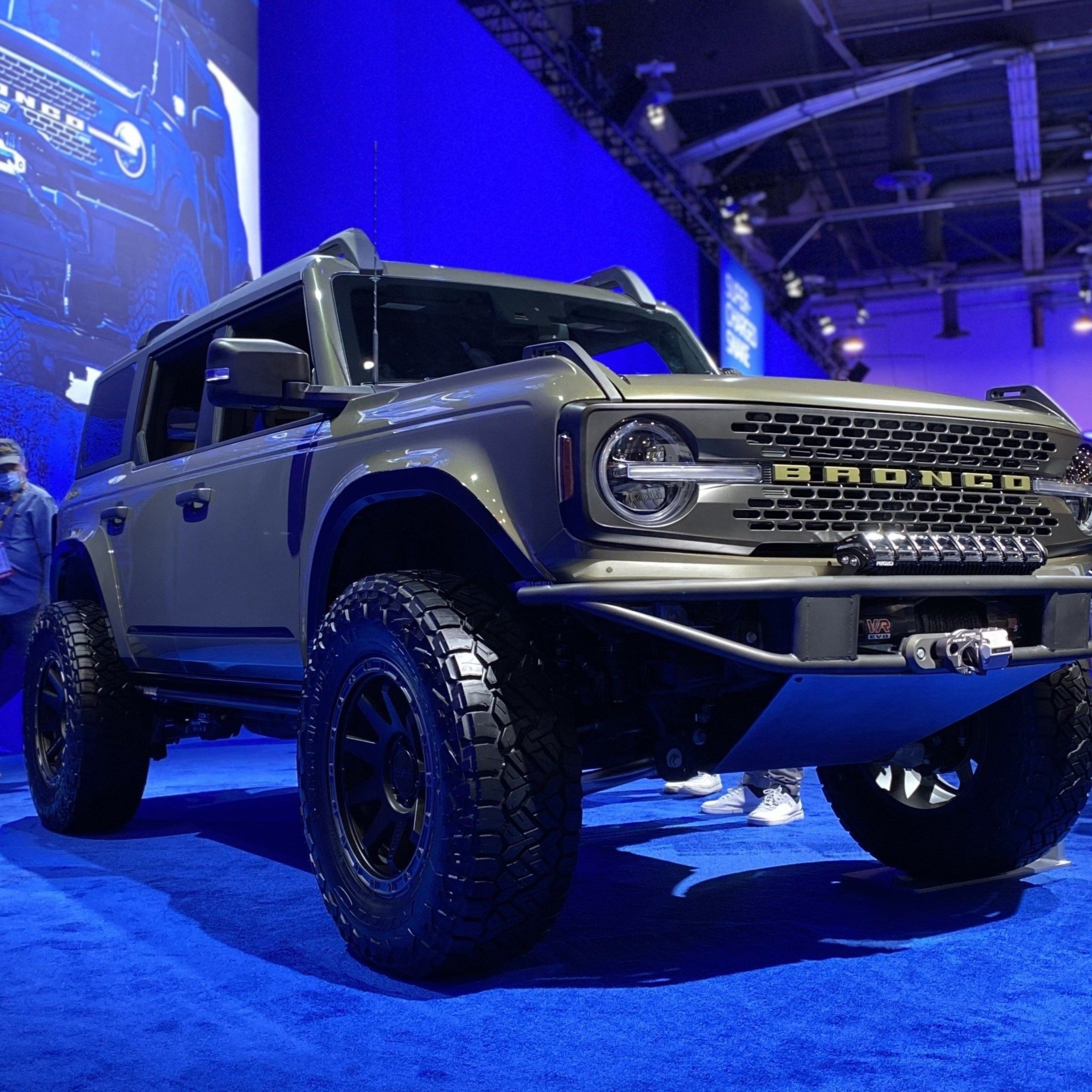 2021-2025 Ford Bronco fenders displayed on a modified Bronco at an automotive event, showcasing offroad capabilities.