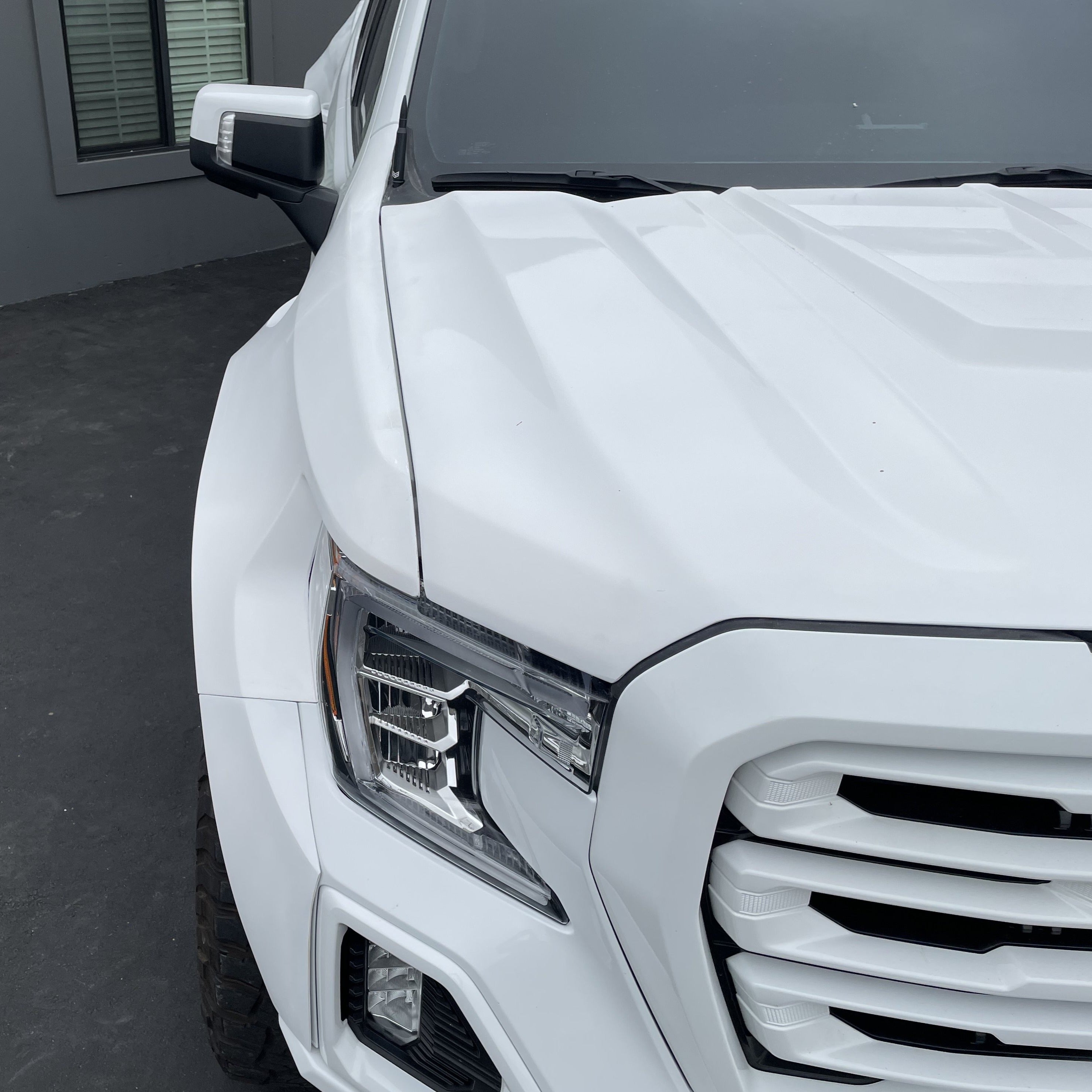 2019-2025 GMC Sierra fenders showcasing a sleek design, enhancing the truck's rugged appearance and performance.