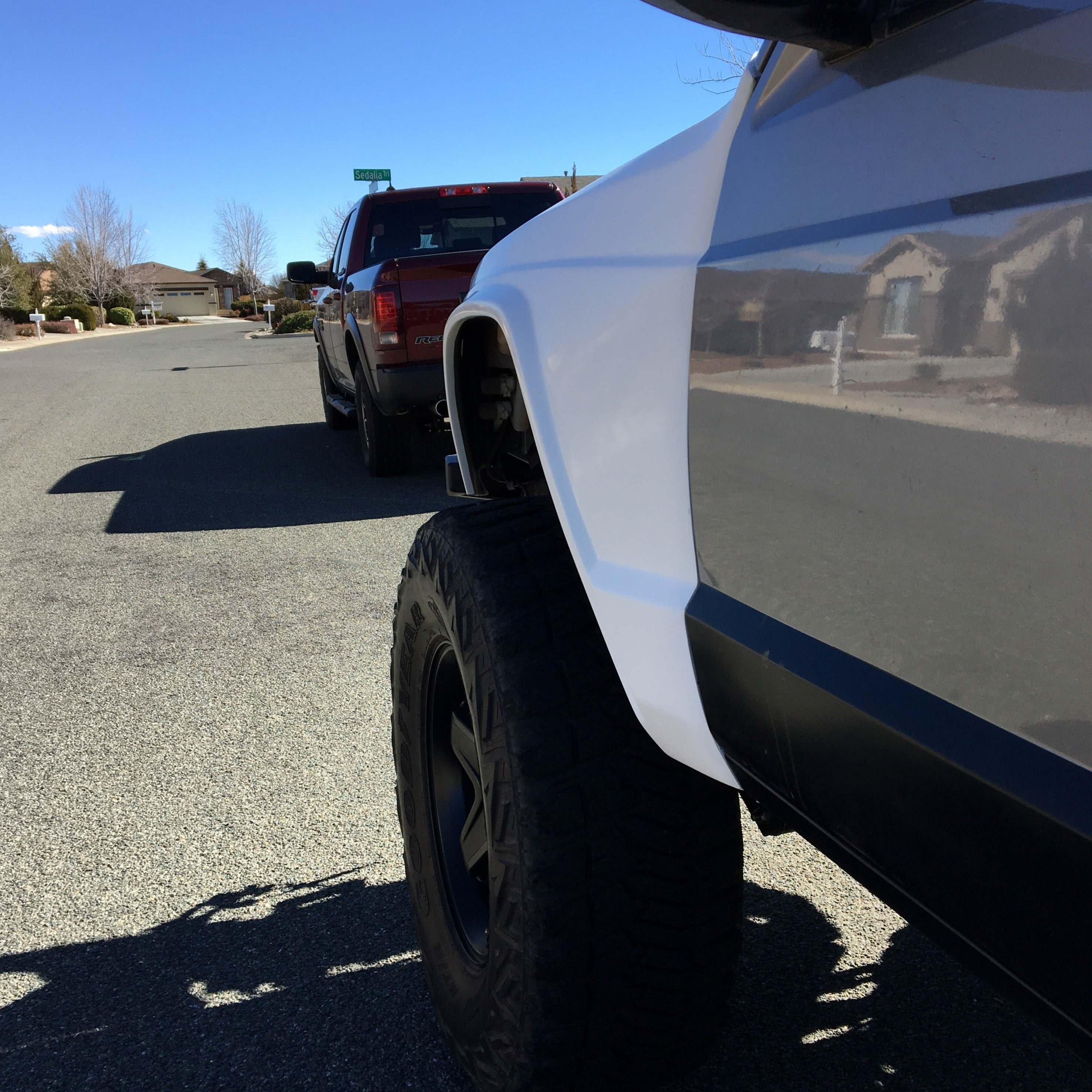 1986-1992 Jeep Comanche fenders showcased on a parked vehicle, highlighting offroad styling and durability.