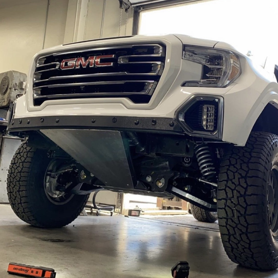 2019-2025 GMC Sierra with upgraded fenders, showcasing a rugged offroad look and enhanced front-end protection.