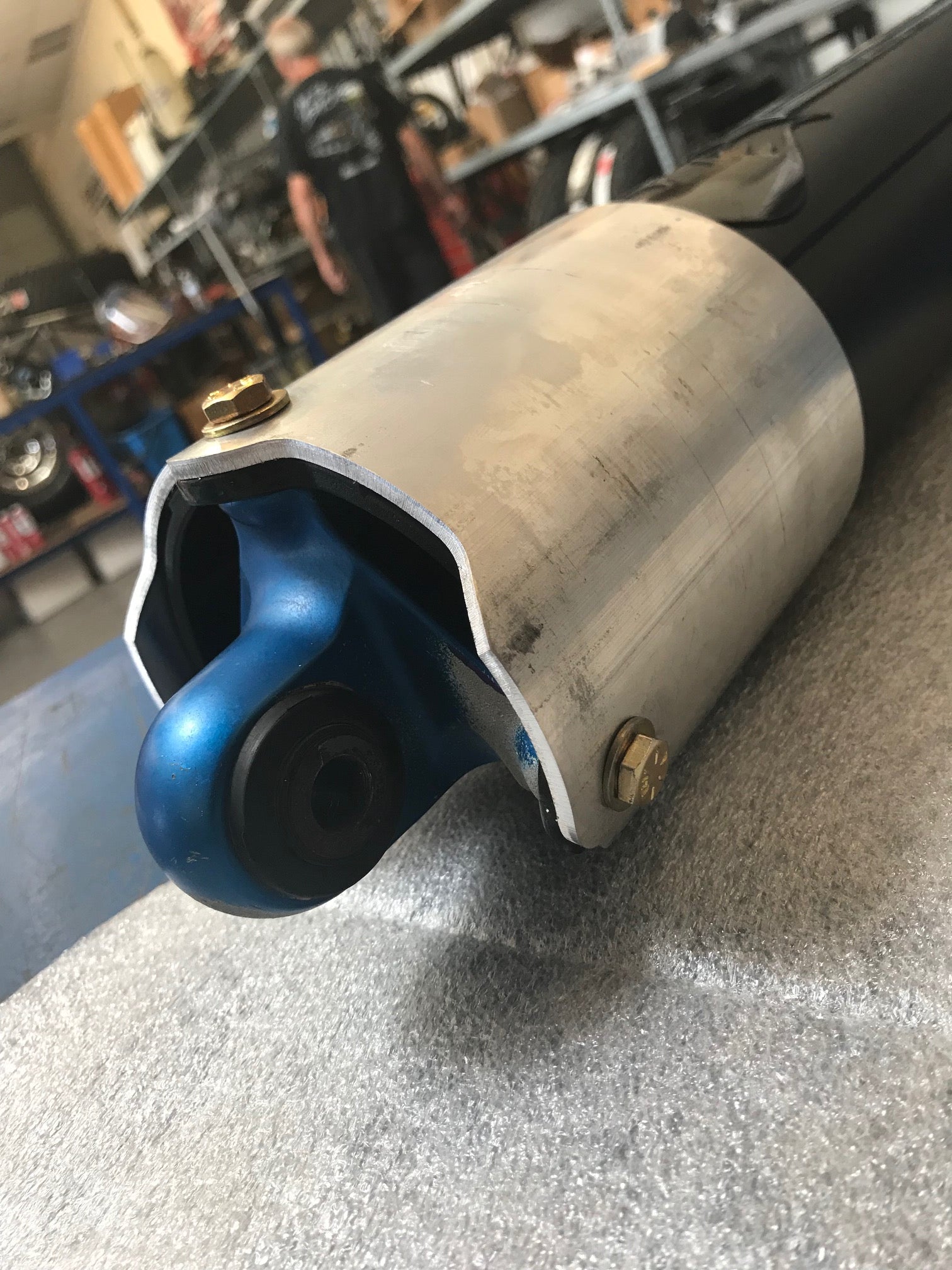 Rear shock guard for 2017-2024 Ford Raptor, designed for protection and enhanced performance. Durable aluminum construction.