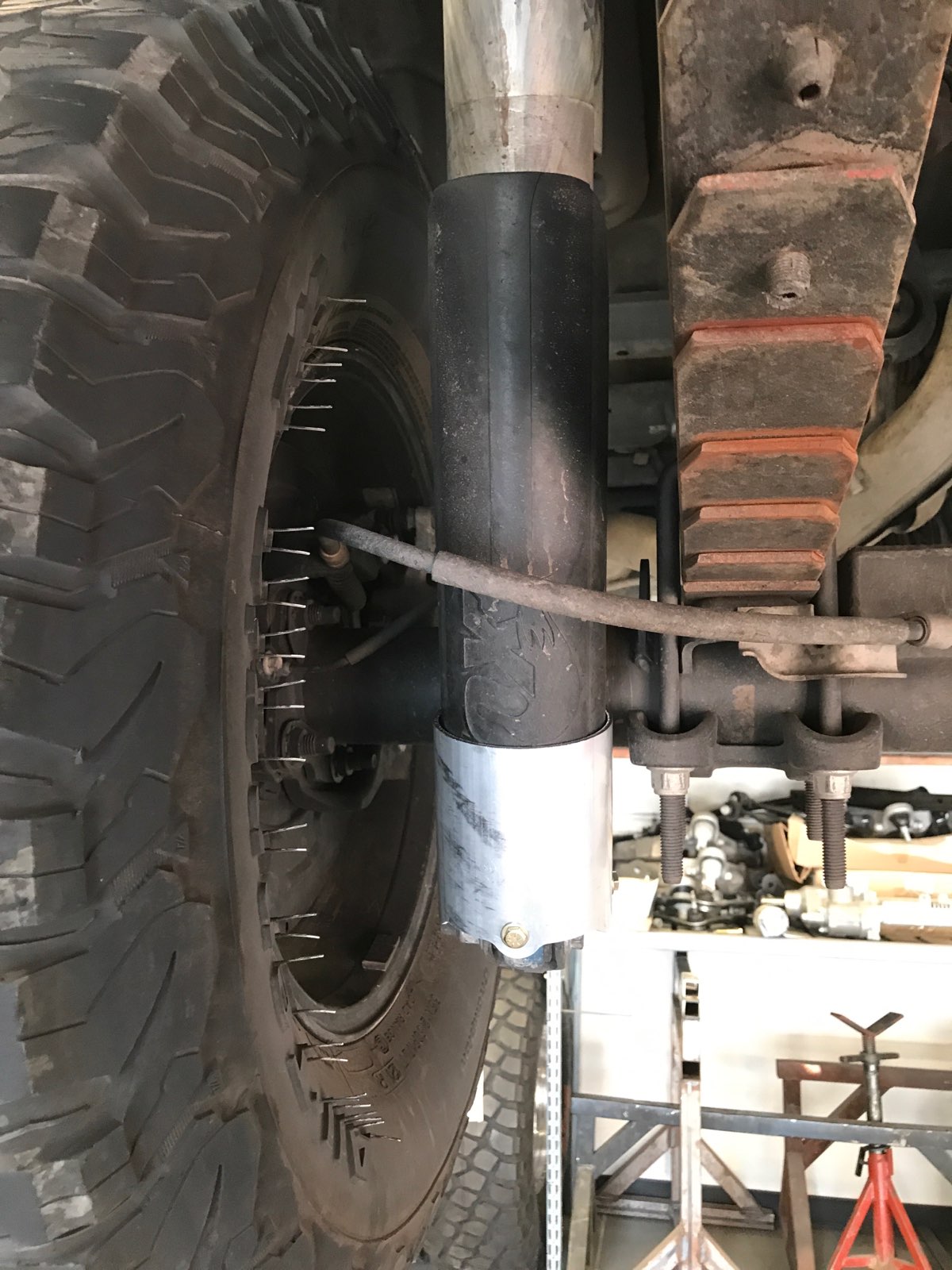 Rear shock guard for 2017-2024 Ford Raptor, designed to protect the shock absorber from damage during off-road use.