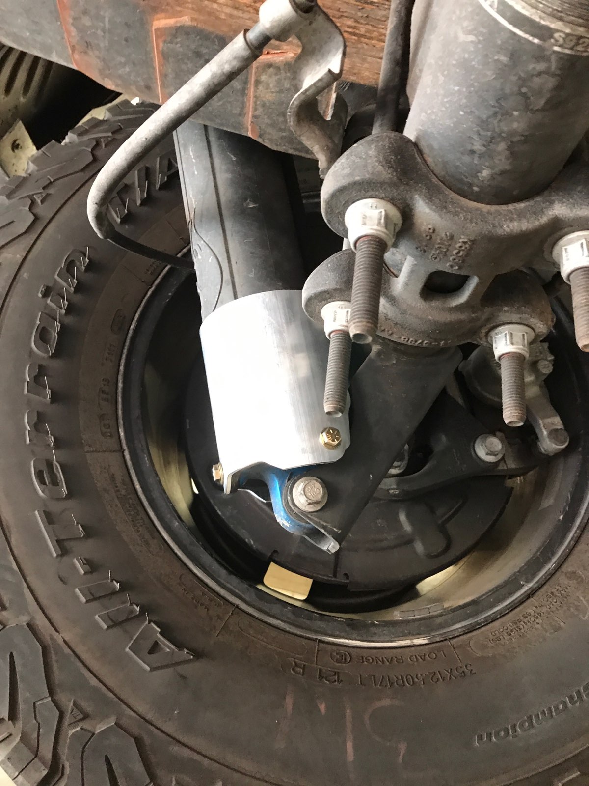 Rear shock guard for 2017-2024 Ford Raptor, designed for enhanced protection and durability on off-road terrains.