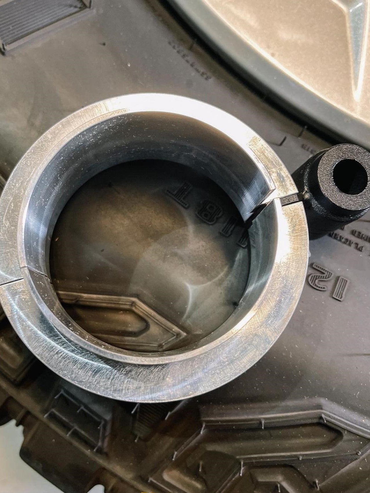 Aluminum spacer from the 2025 Ram RHO 2 inch front leveling kit, designed for enhanced vehicle height and stance.