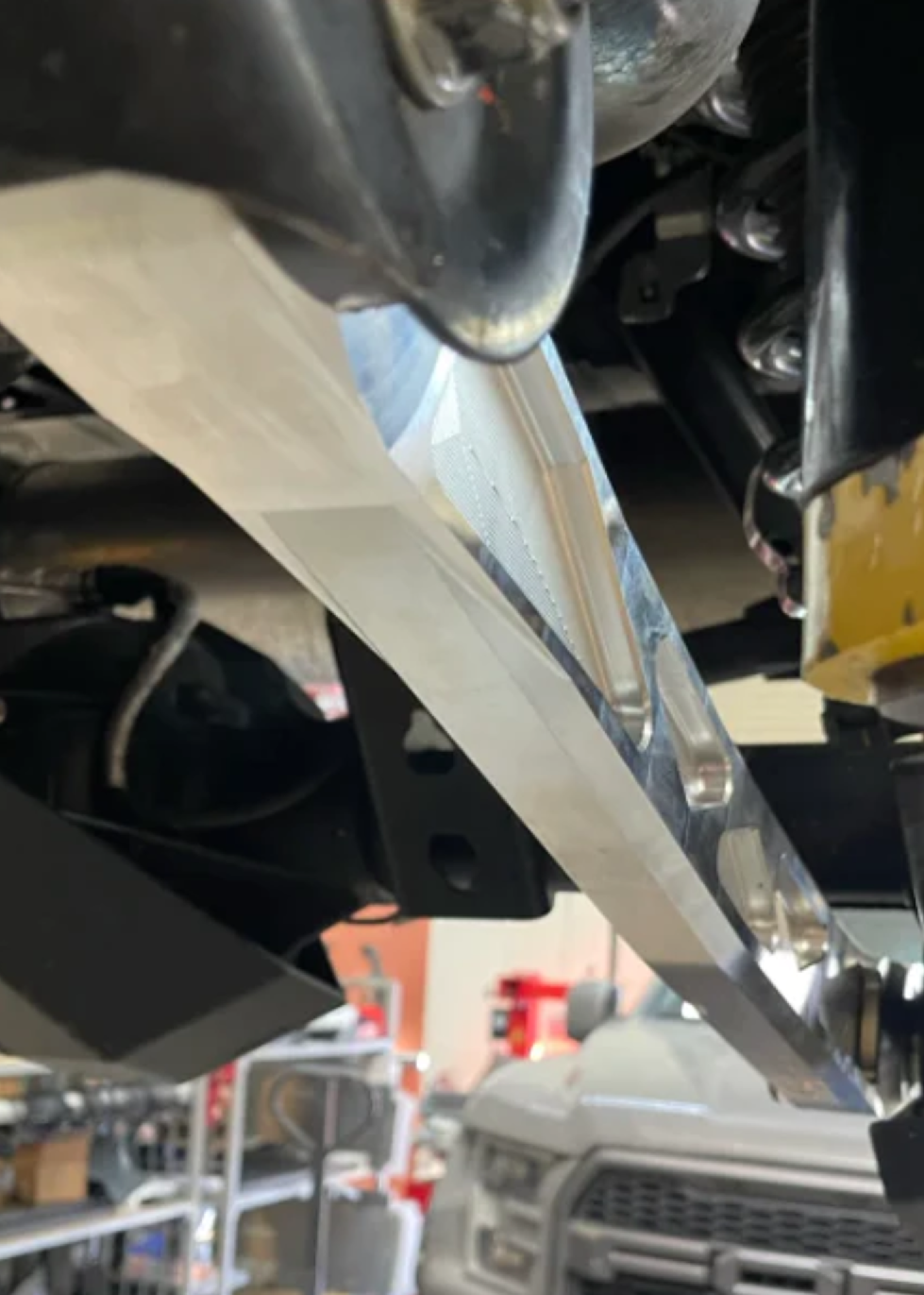 2024 Ranger Raptor rear lower billet aluminum suspension arms featuring Ultra-Flex joints, showcasing durable construction and design.