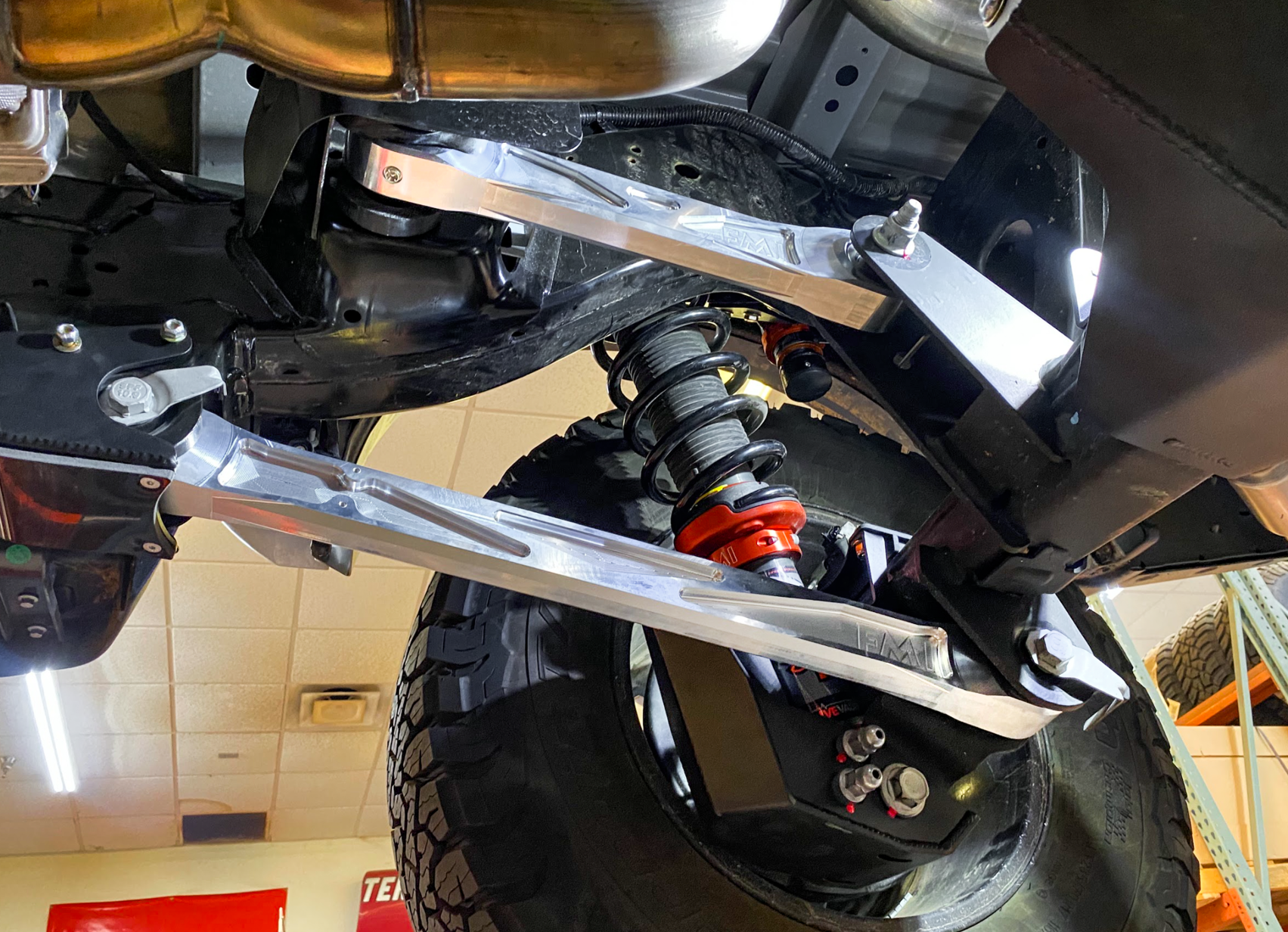 2024 Ranger Raptor rear suspension kit featuring billet aluminum arms and Ultra-Flex joints for enhanced off-road performance.