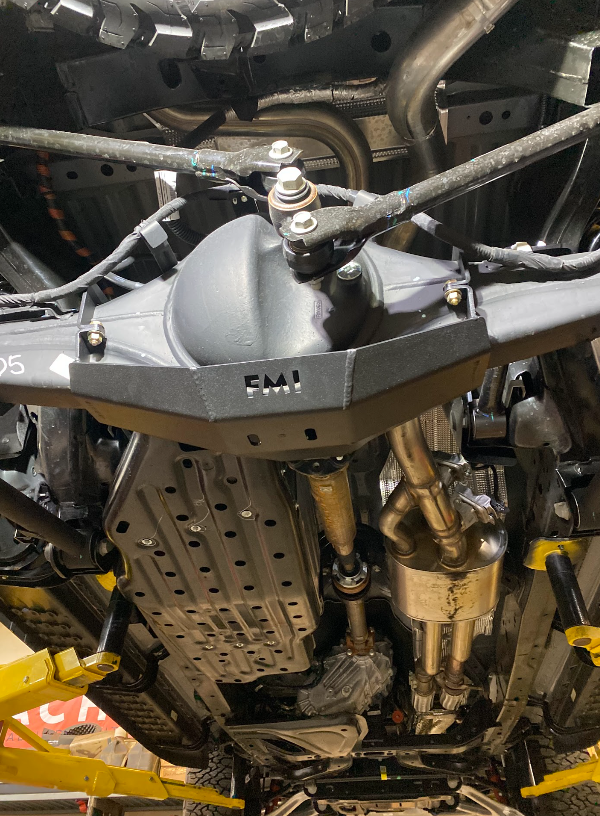 2024 Ranger Raptor rear differential skid plate installed, showcasing robust protection and undercarriage design for offroad durability.
