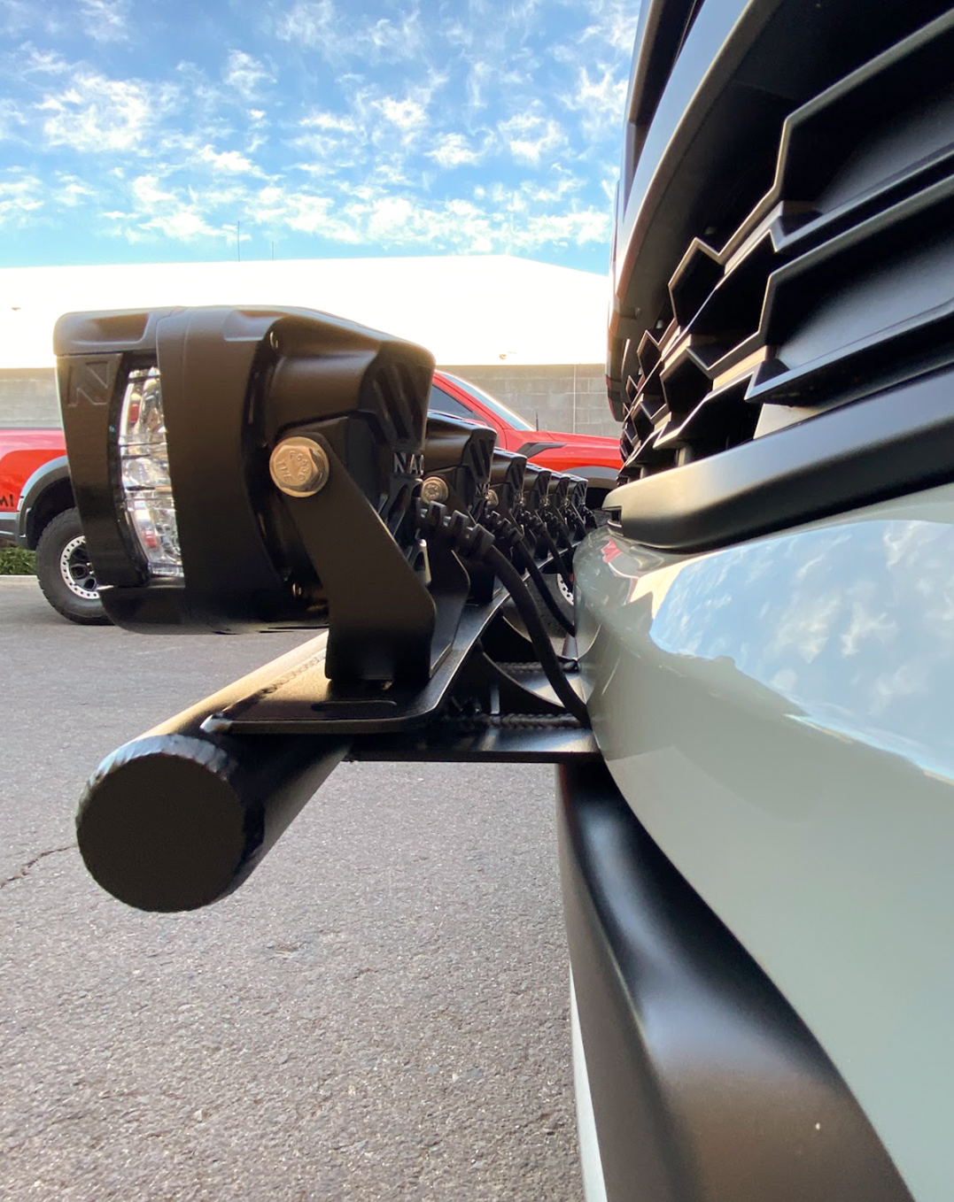 2024 Ranger Raptor Front Light Mount Kit installed on a stock bumper, showcasing versatility for any light setup.