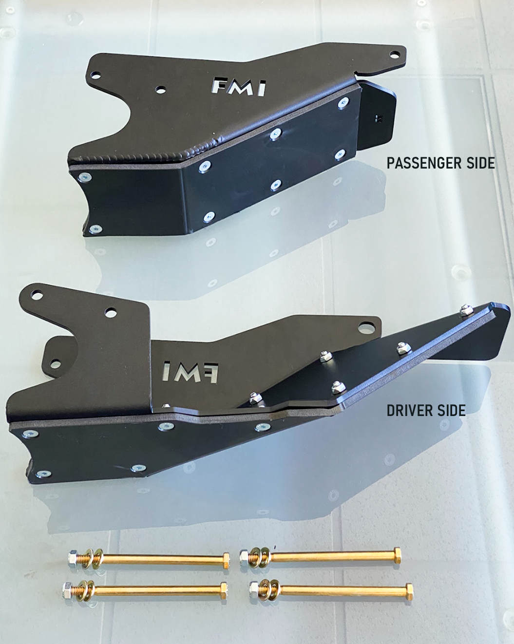 2024 Ranger Raptor rear lower arm frame guard with HDPE slide, featuring passenger and driver side components and installation hardware.