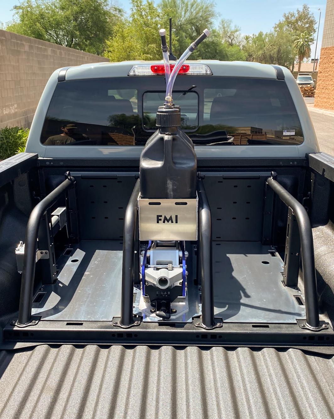 Modular bed organizer for 2024 Ranger and Ranger Raptor, featuring a secure fuel can holder and tool storage system.
