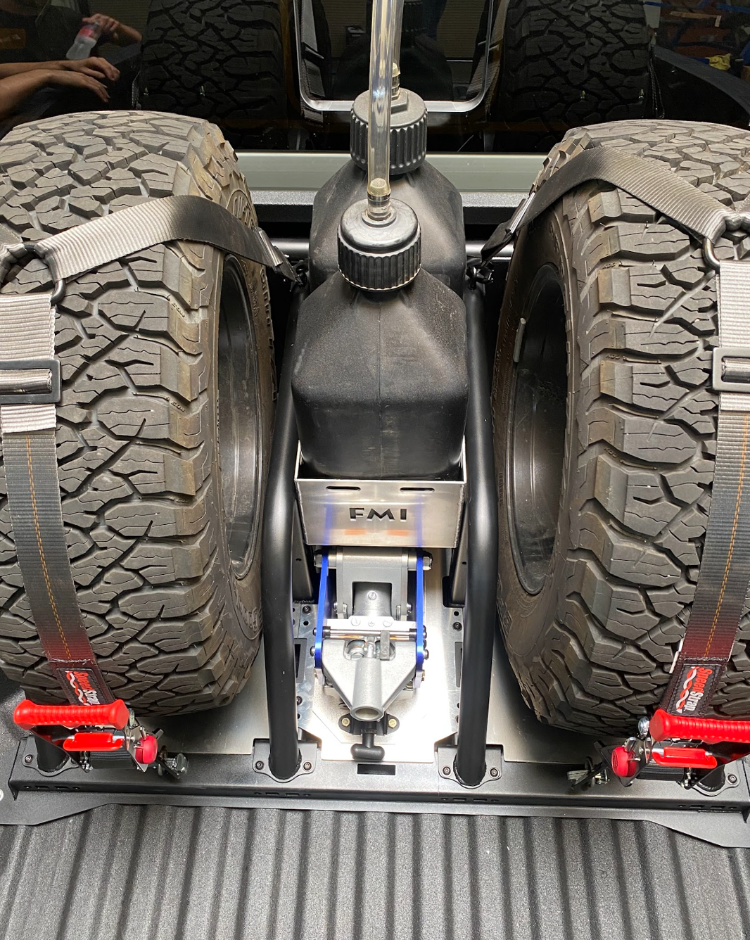 Modular bed organizer for 2024 Ranger and Ranger Raptor, featuring secure tire storage and tool mounting options.