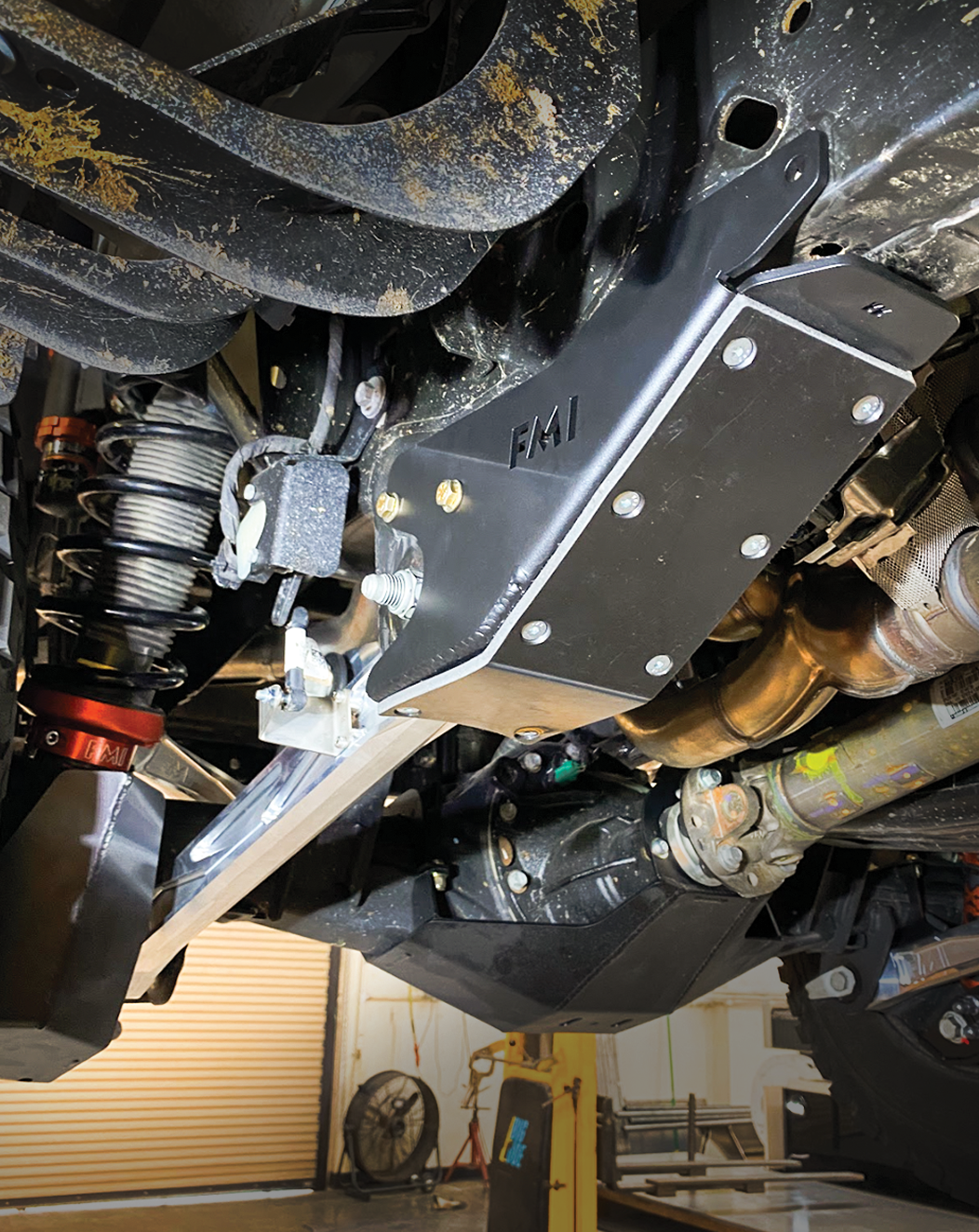 2024 Ranger Raptor rear lower arm frame guard featuring HDPE slide for enhanced protection and durability during off-road use.