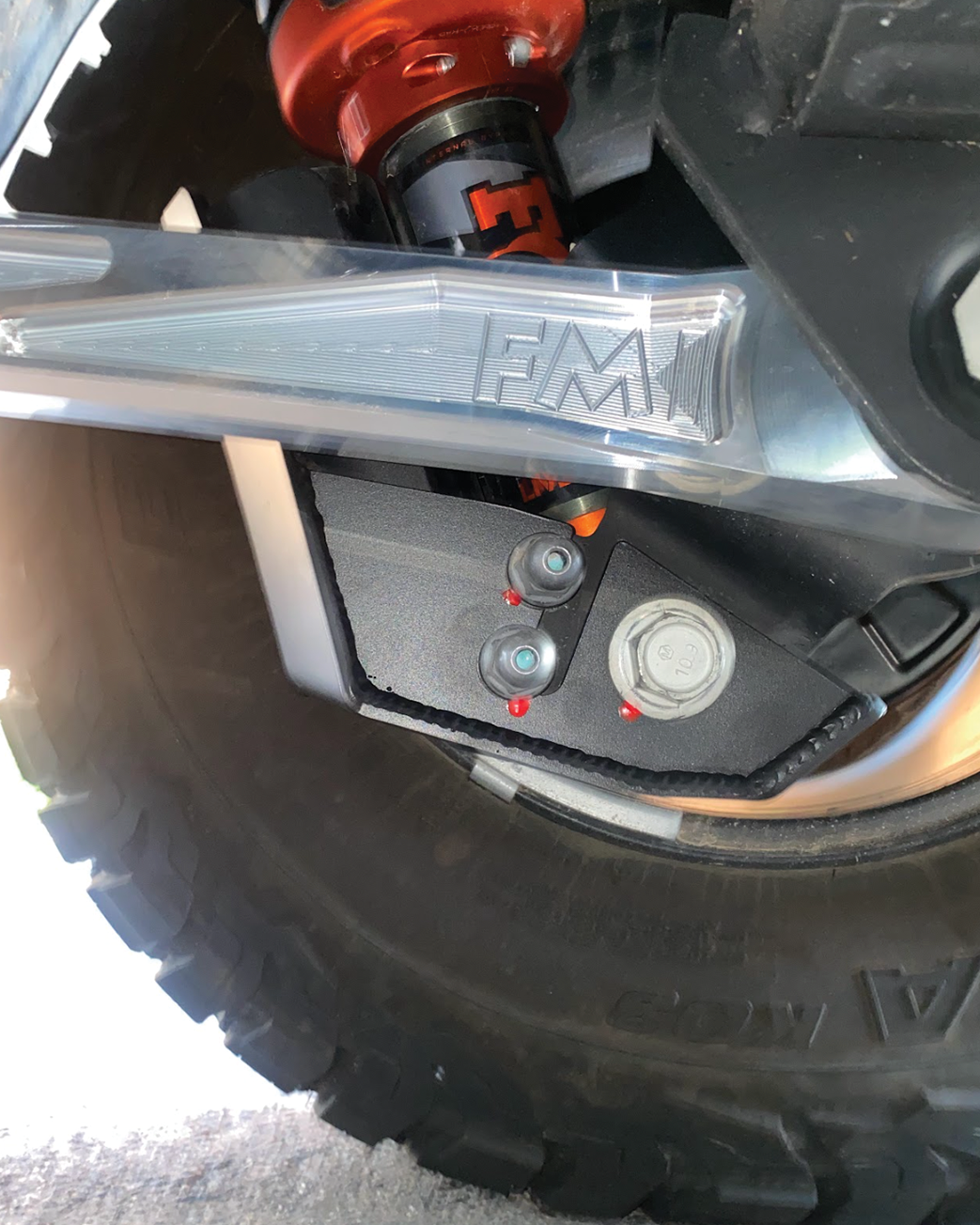 2024 Ranger Raptor rear shock skid kit installed, showcasing durable protection for offroad performance.