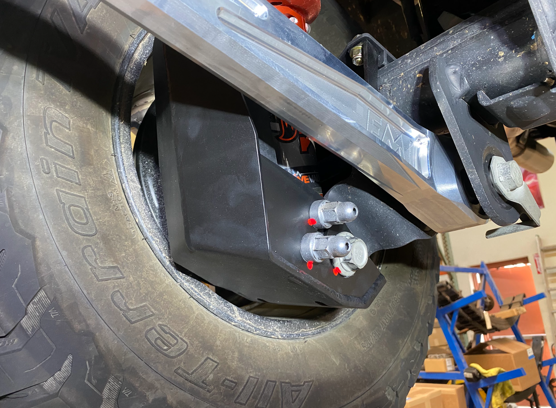 2024 Ranger Raptor rear shock skid kit installed, showcasing robust protection and durable design for offroad performance.