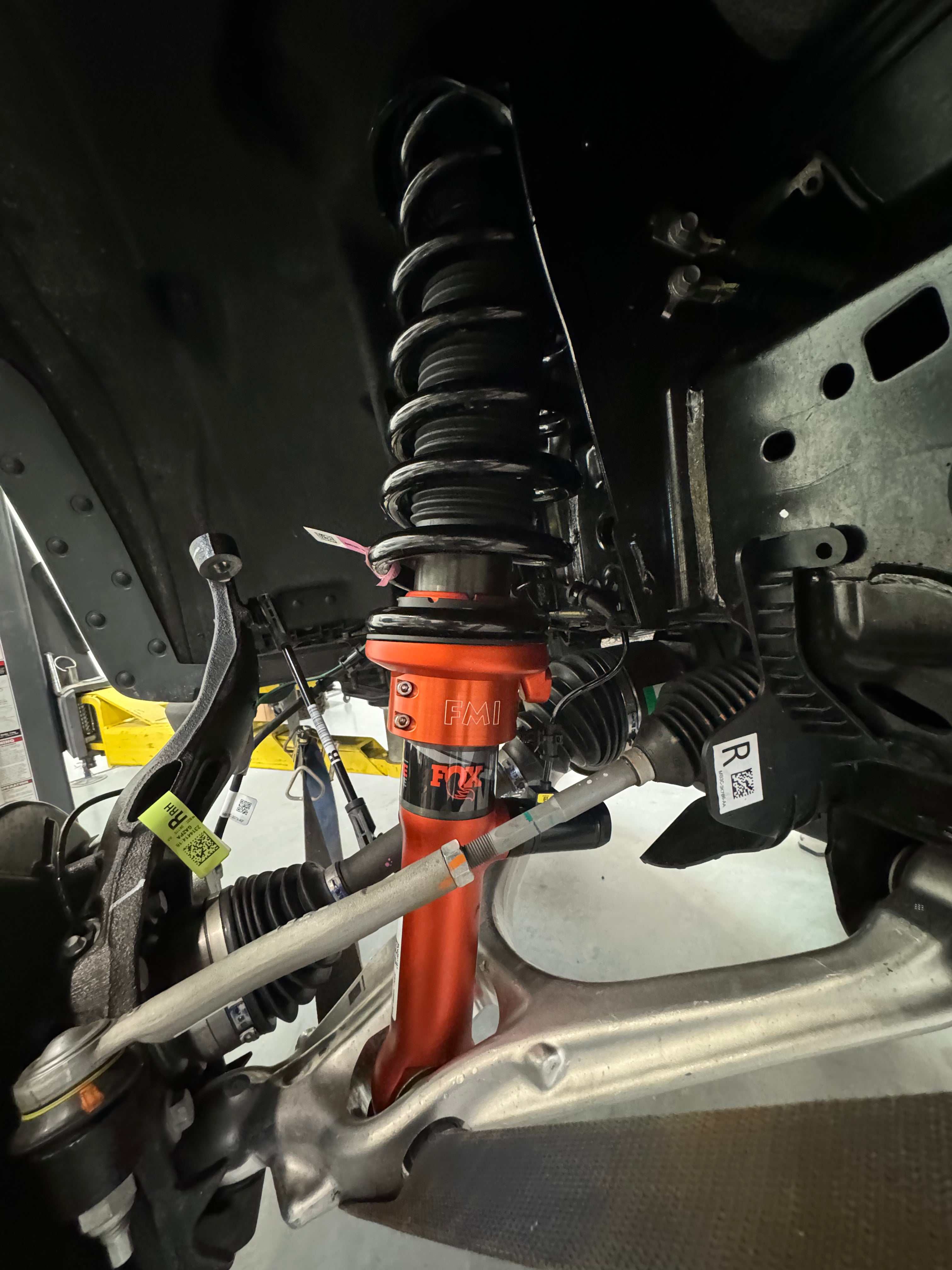 2024+ Ranger Raptor Spring Collar Lift Kit showcasing a Fox shock absorber and suspension components for enhanced offroad performance.