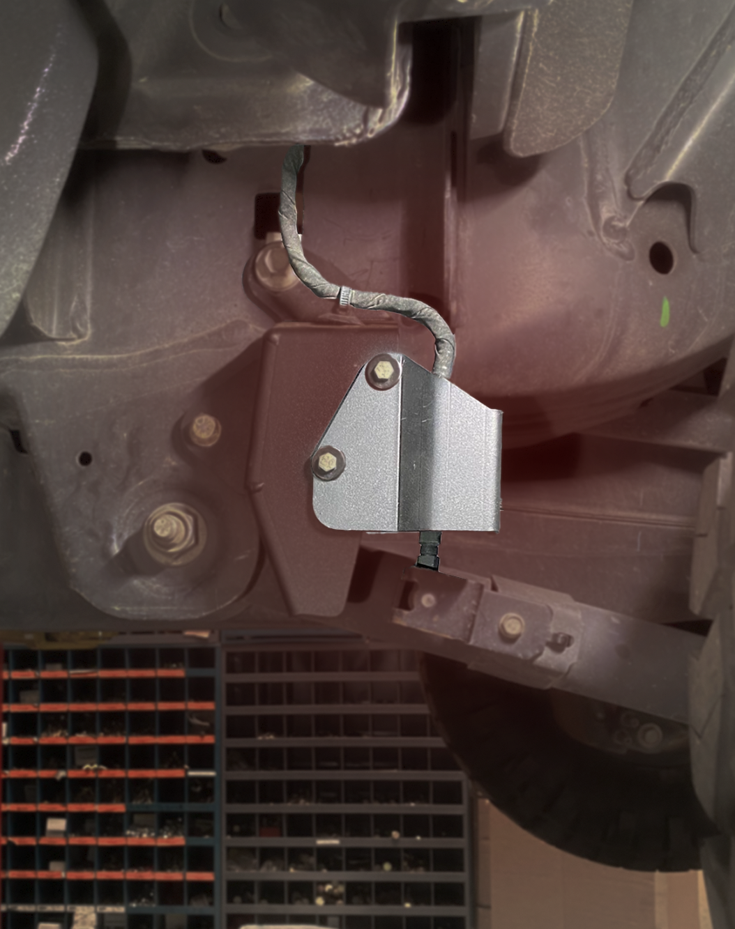Rear suspension travel sensor wire protector for 2024+ Ranger Raptor, designed for enhanced durability and protection.
