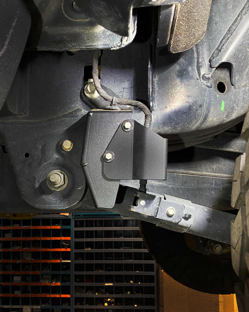 Rear suspension travel sensor wire protector for 2024+ Ranger Raptor, enhancing durability and performance in offroad conditions.
