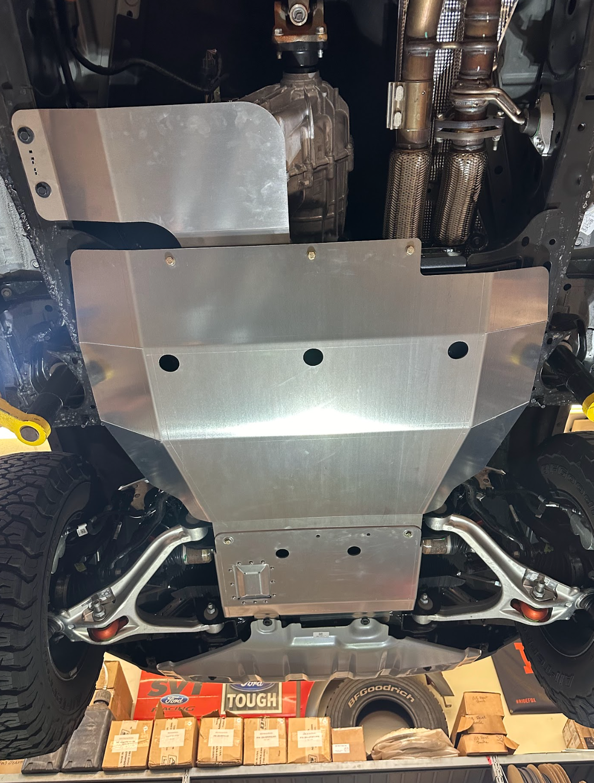 2024 Ford Ranger Raptor skid plate installed, showcasing durable aluminum construction and undercarriage protection.