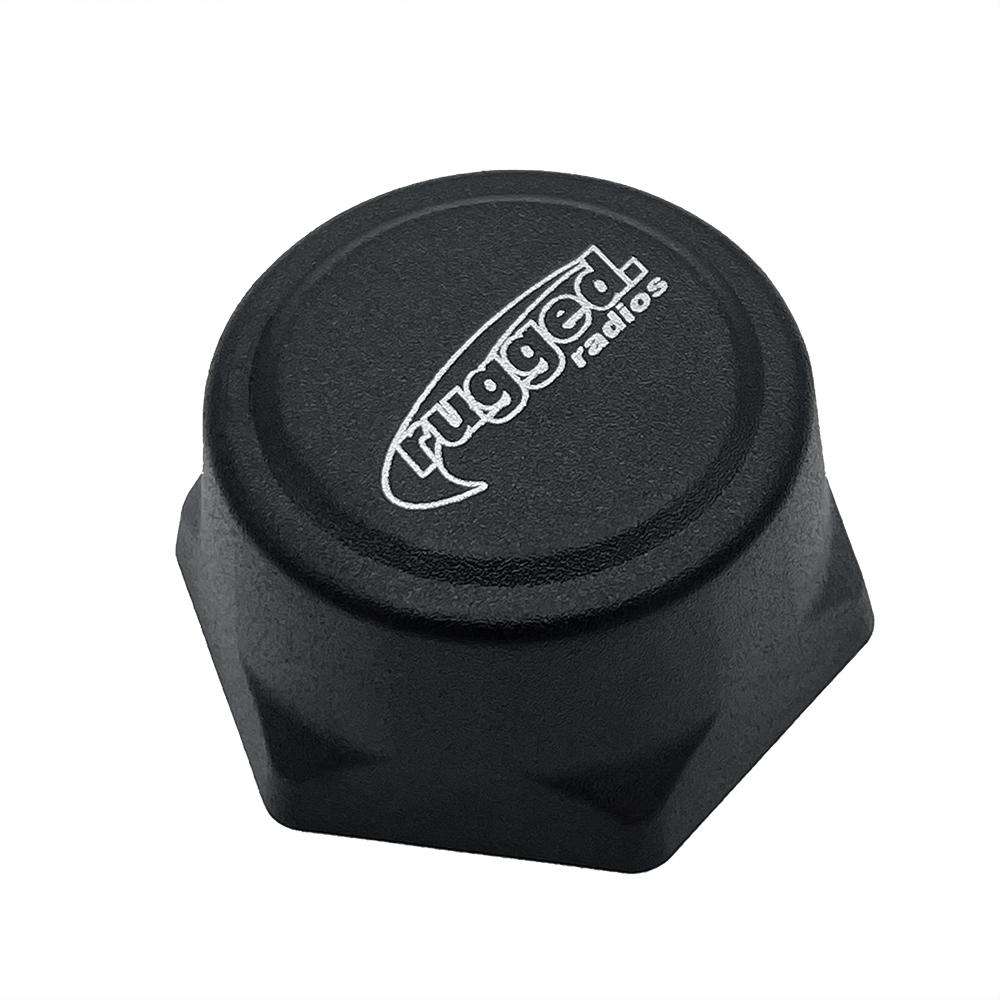 Antenna coax cable cap for NMO mounts, featuring a durable black design with Rugged Radios branding.