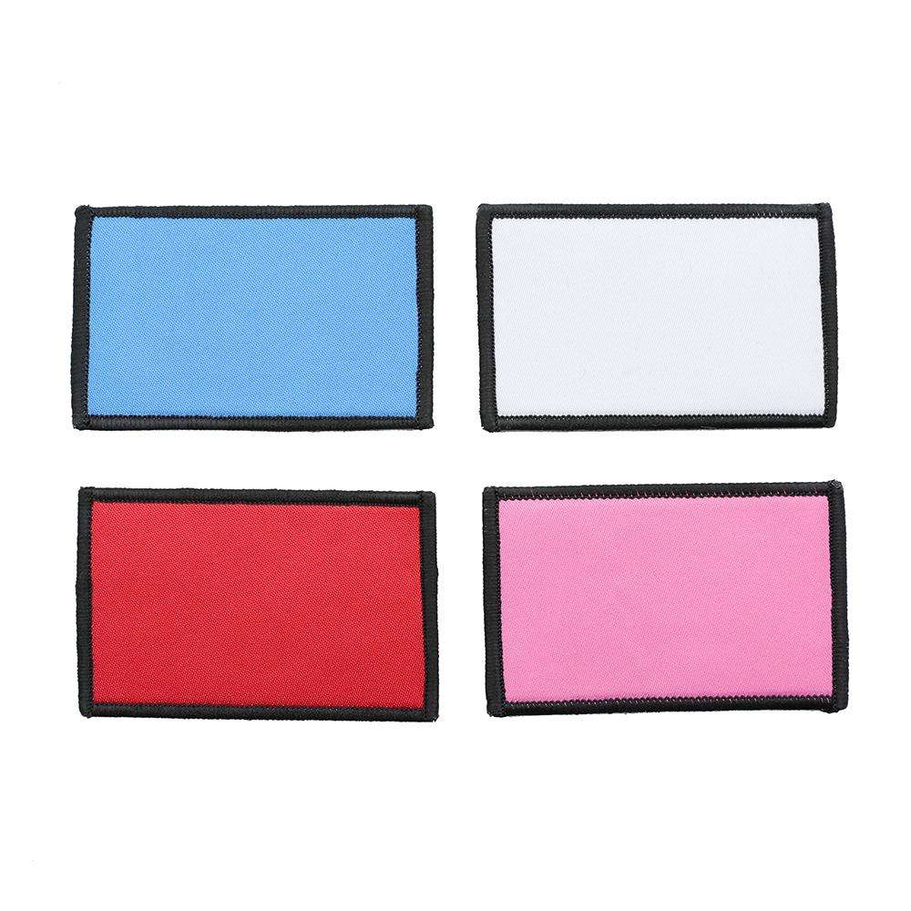 Blank morale patch kit featuring four rectangular patches in blue, white, red, and pink with black borders.