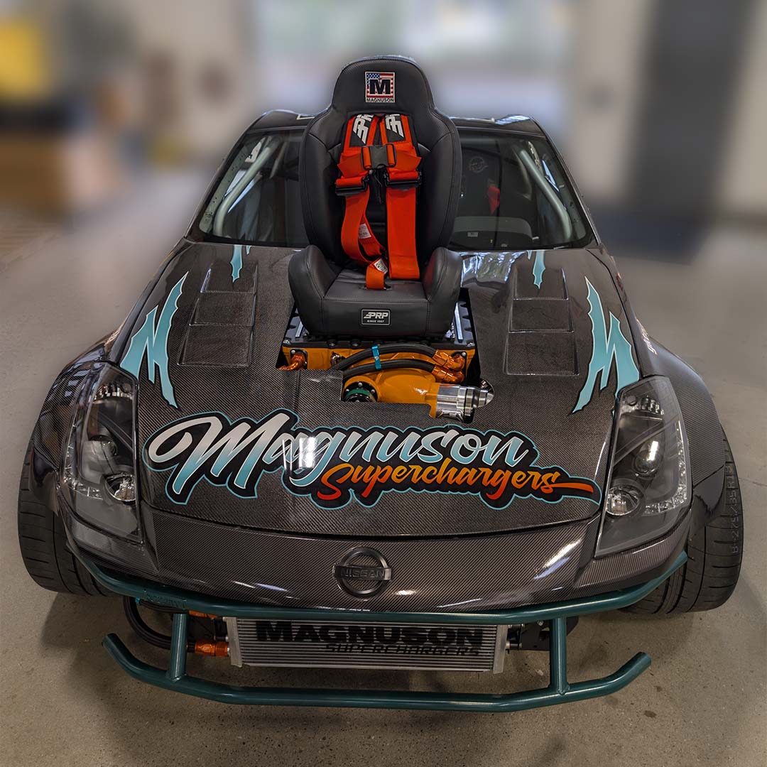 Custom car featuring a B.O.O.S.T.E.R. S.E.A.T. installed, showcasing a sleek design and performance enhancements.