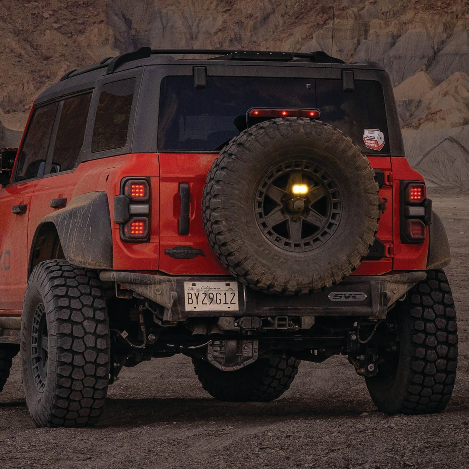2021 Ford Bronco Baja rear bumper with spare tire, showcasing rugged design for offroad performance.
