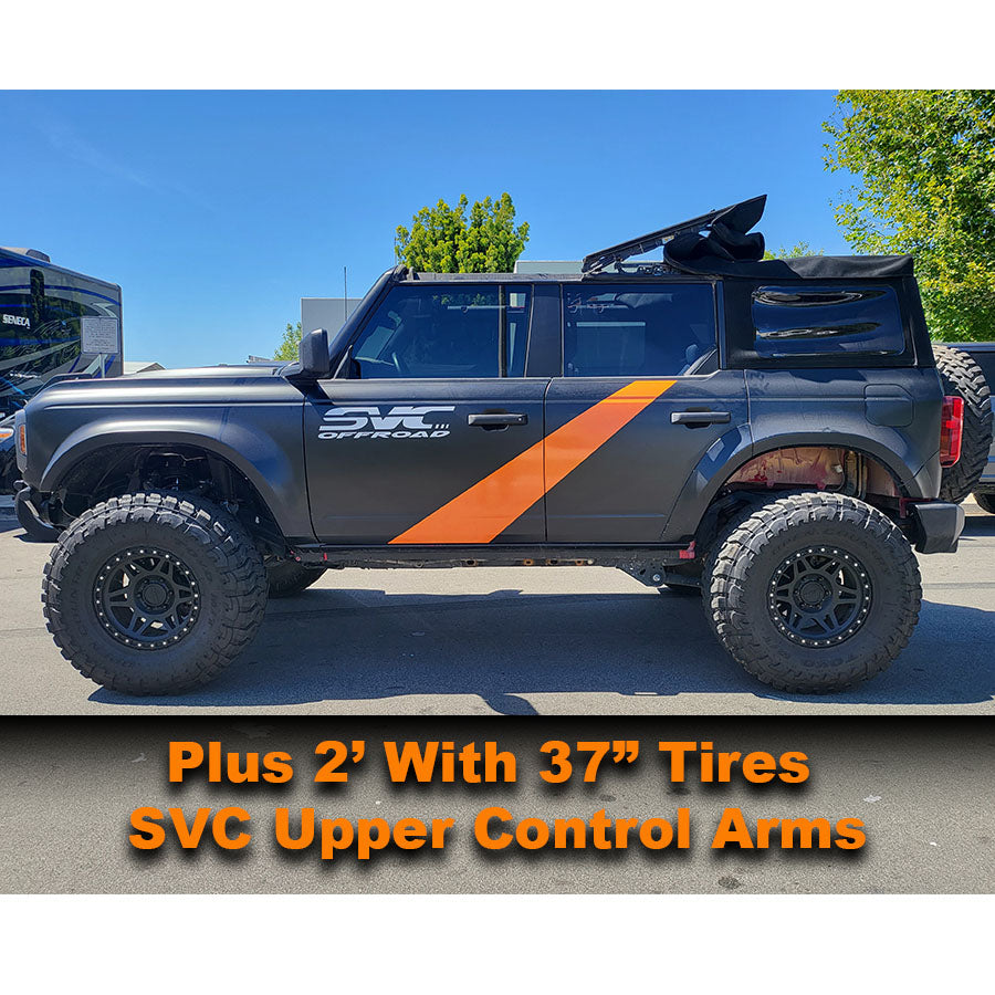 2021 Ford Bronco with coil spacers and 37-inch tires, showcasing enhanced suspension and off-road capability.