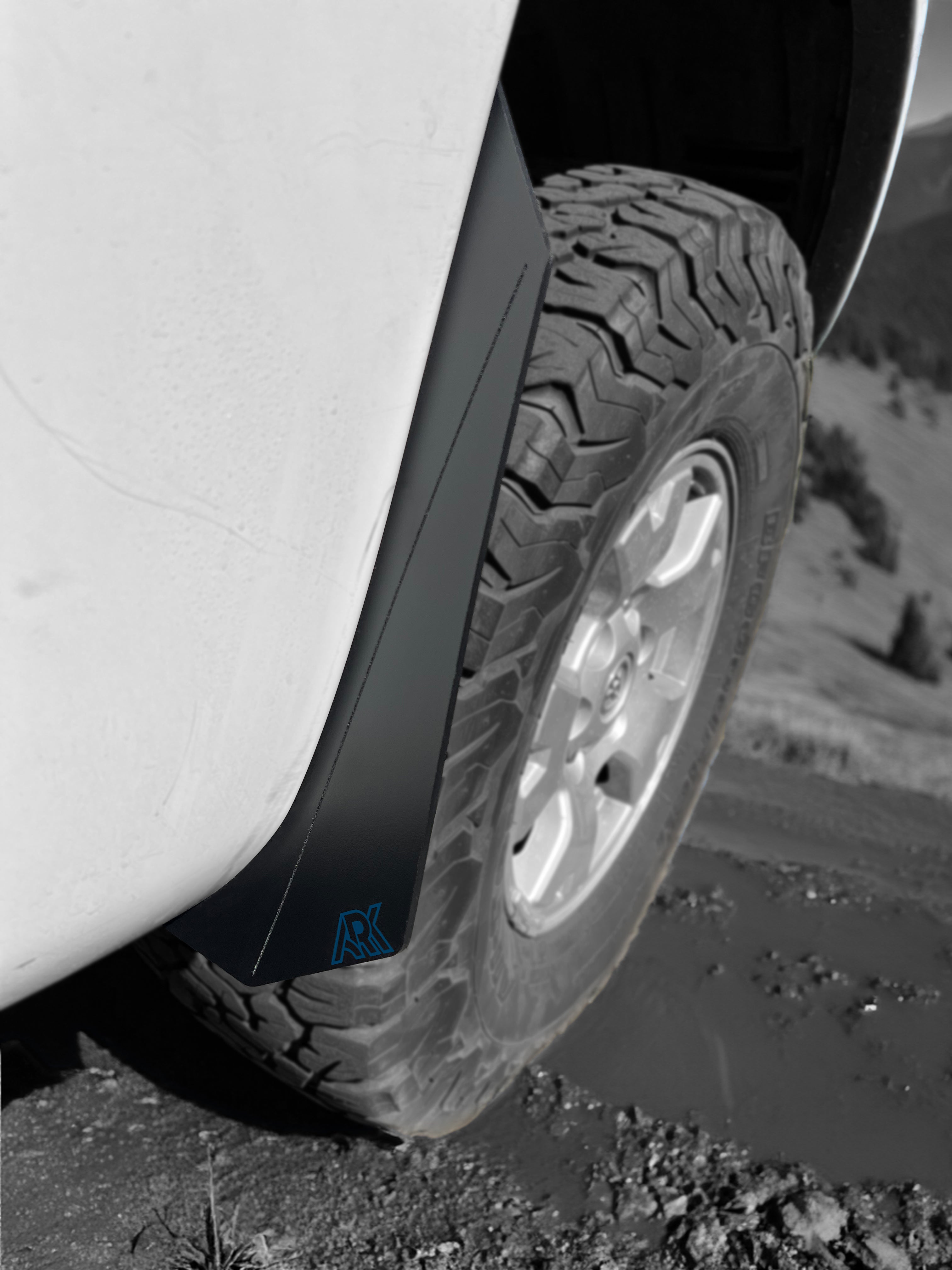 Durable TriXpoly splash guards for 2005-2015 Toyota Tacoma, designed to protect against mud and debris.